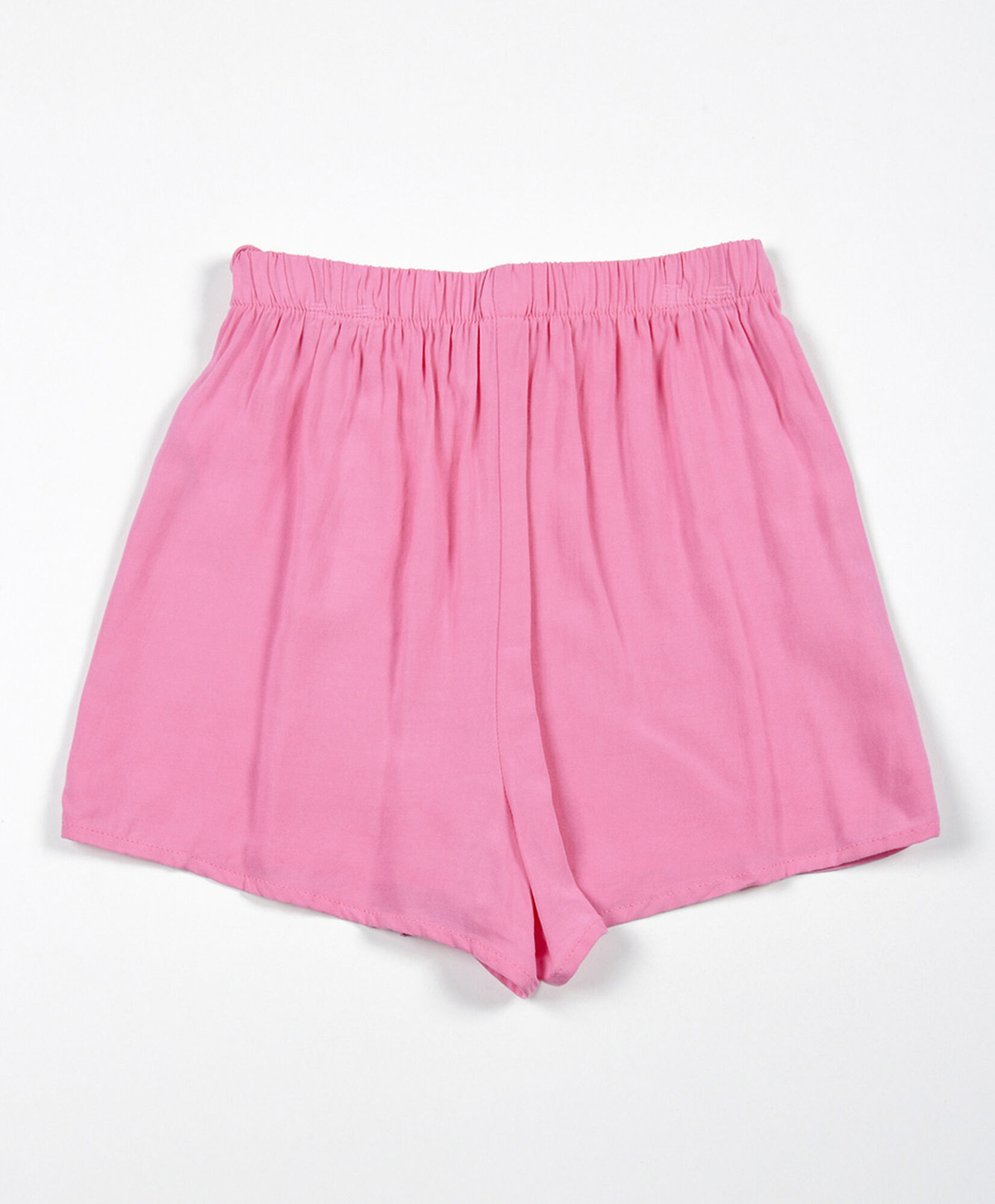 Short niña estilo falda lazo fucsia Short niña estilo falda lazo fucsia