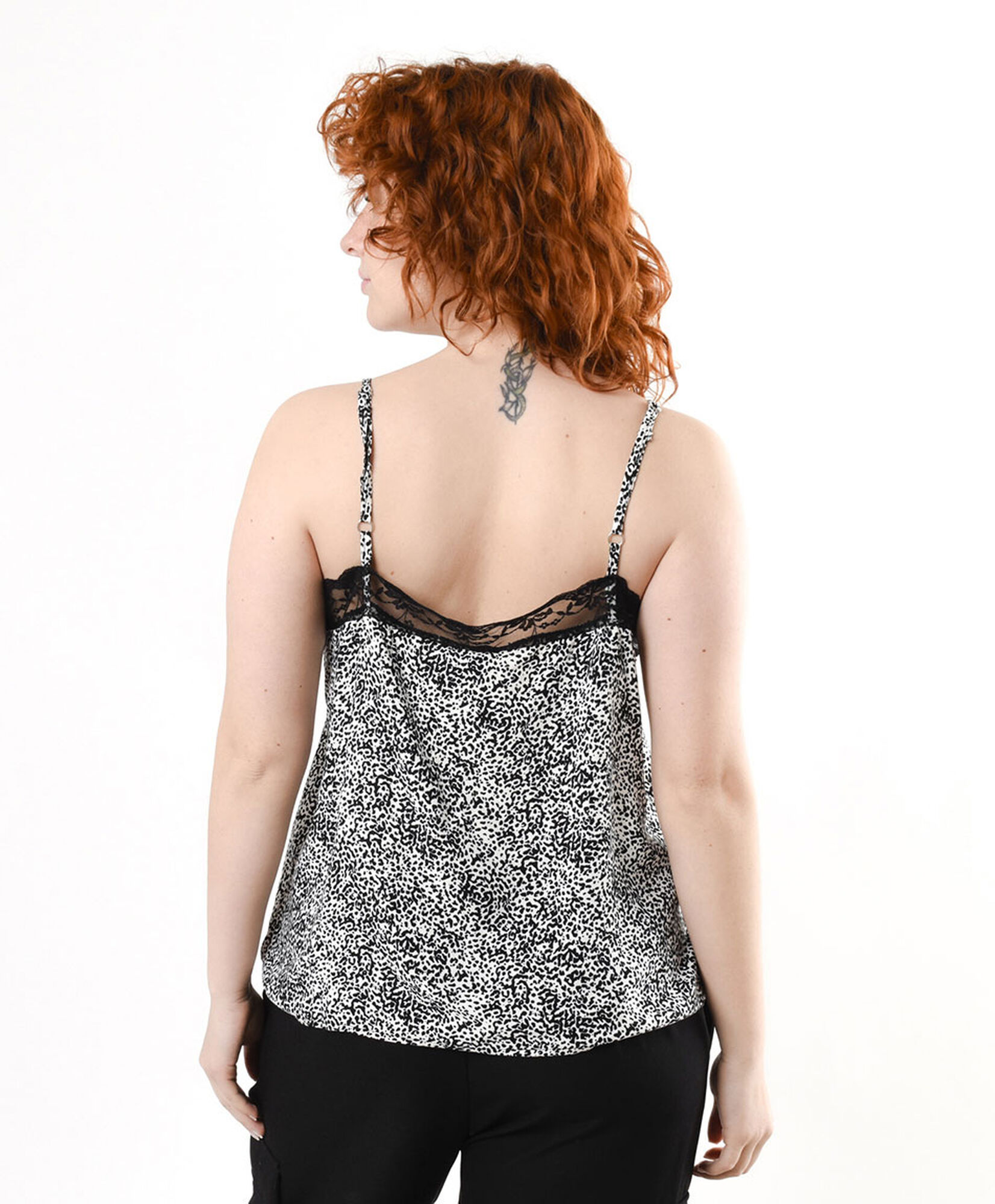 Polera mujer animal print negro encaje Polera mujer animal print negro encaje