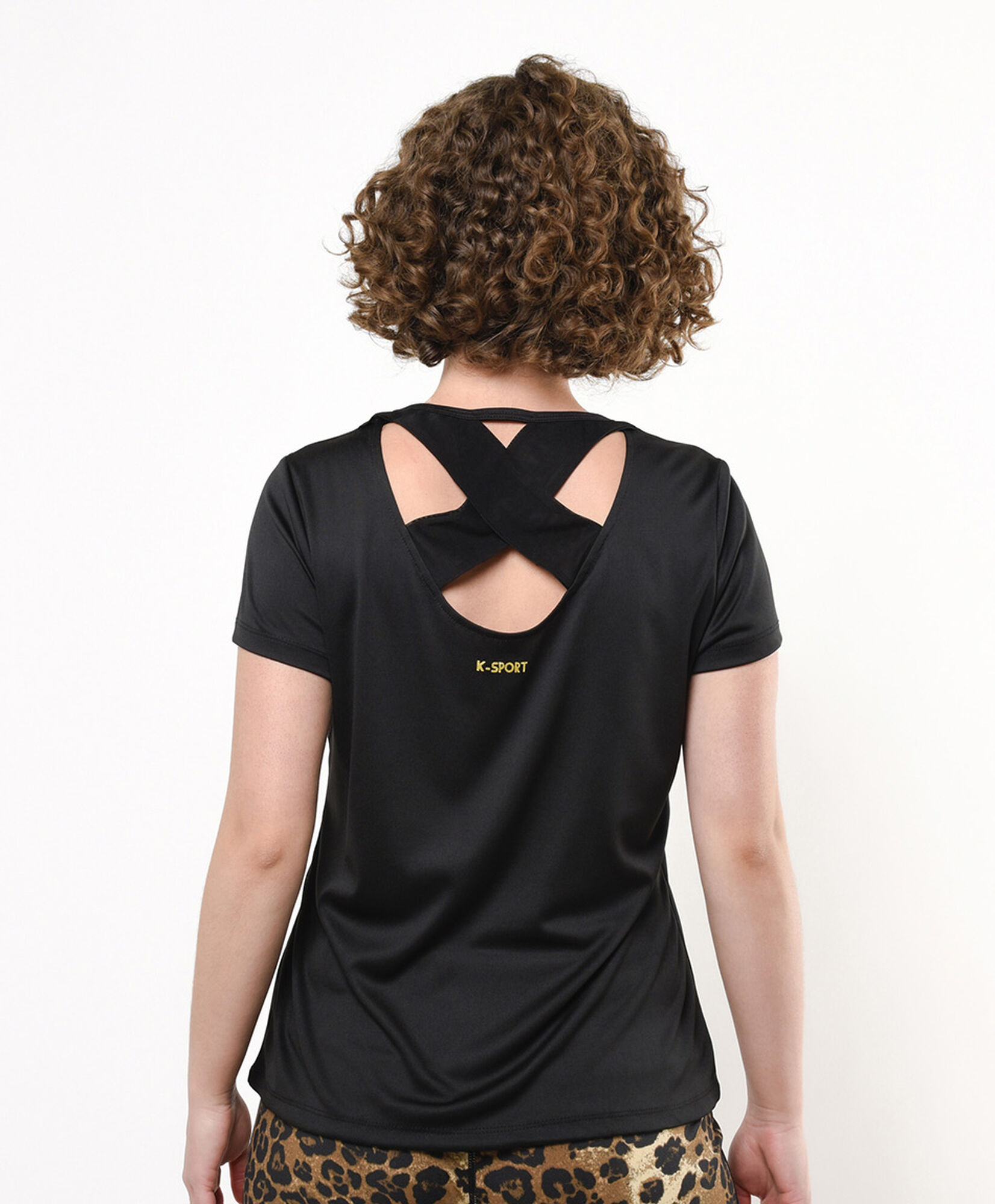 Polera deportiva mujer espalda cruzada TRICOT