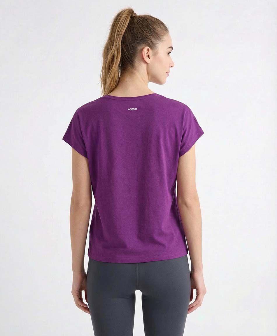 Polera deportiva mujer sentidos purpura