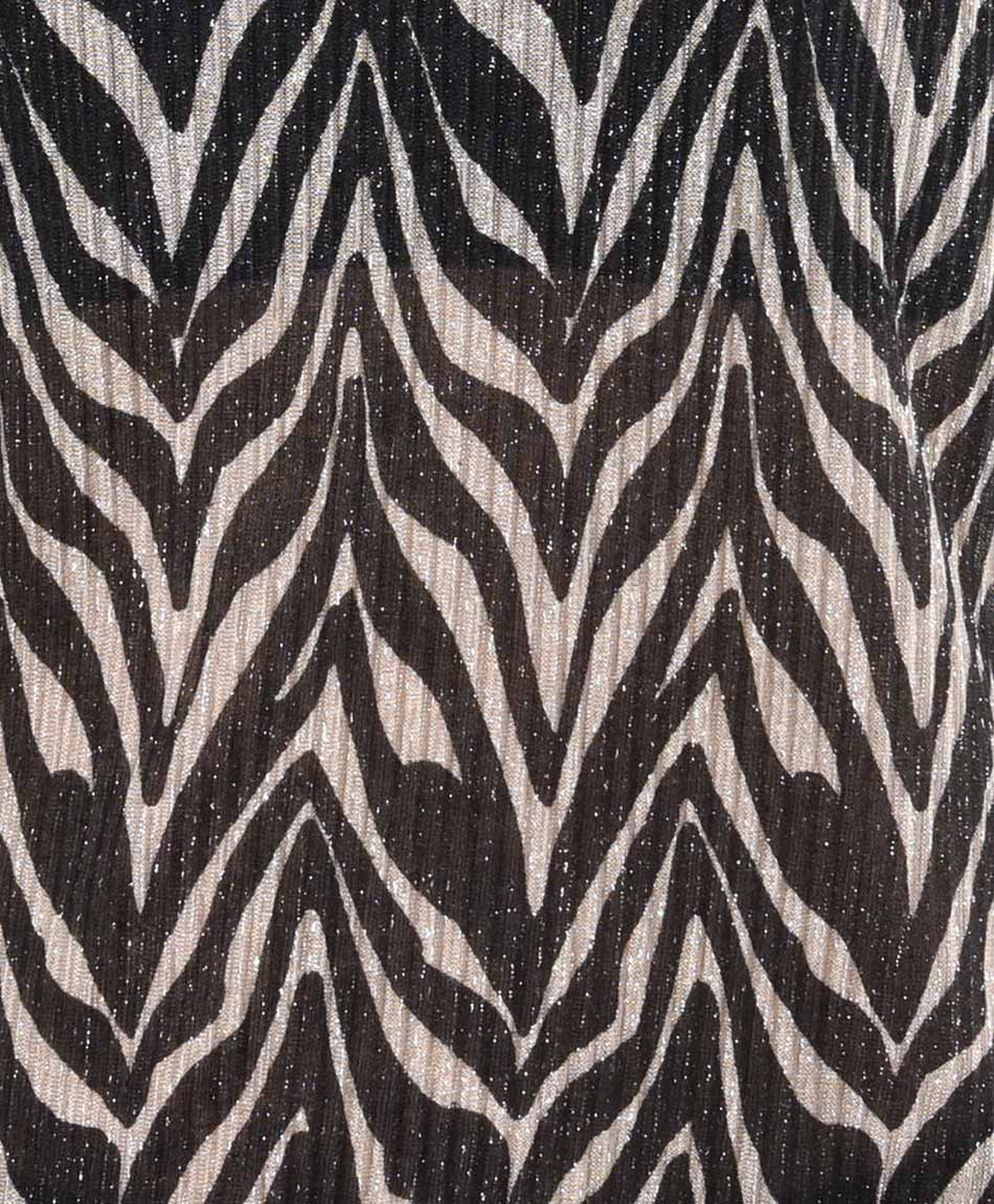 Polera mujer animal print brillos Polera mujer animal print brillos
