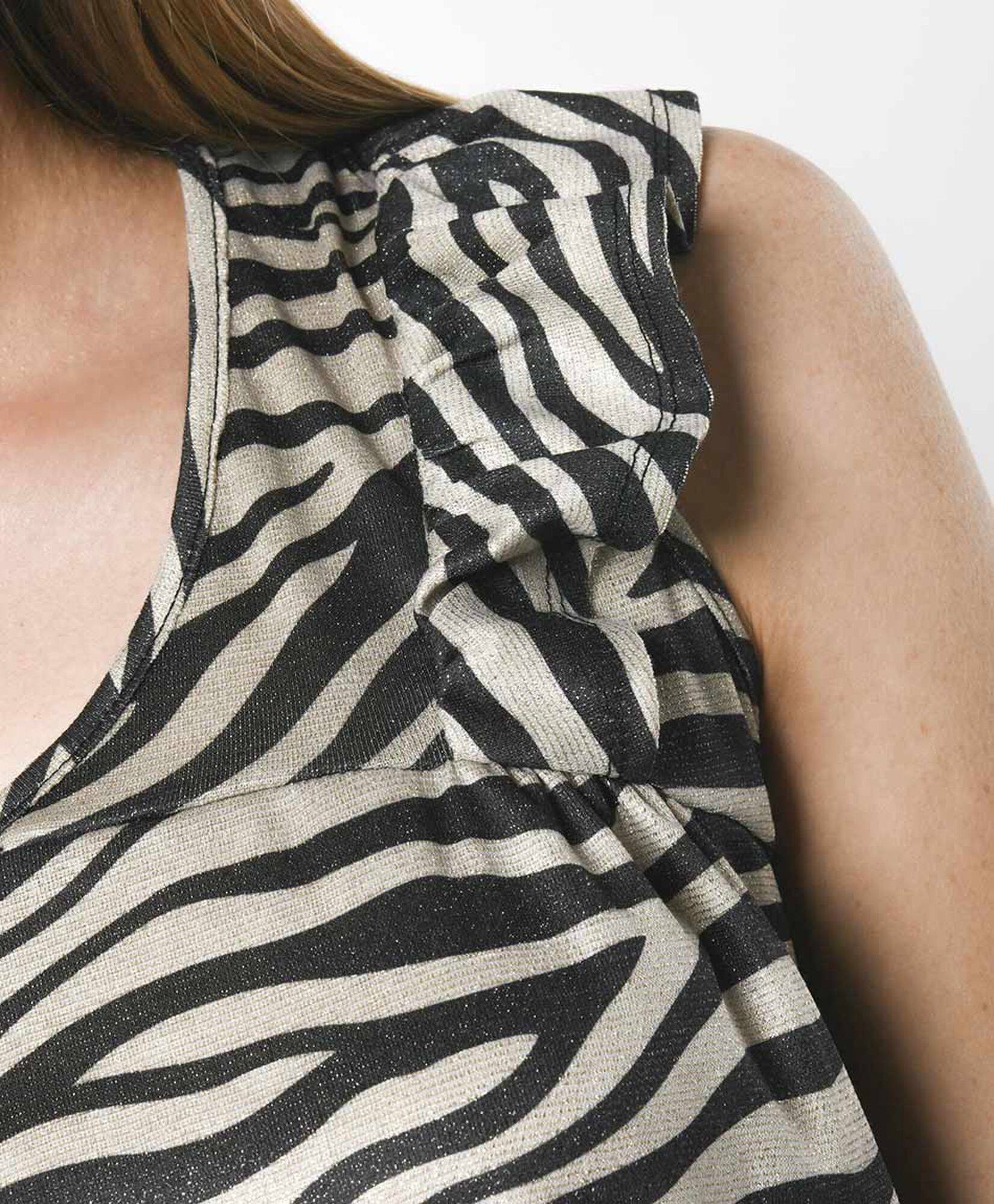 Polera mujer animal print brillos Polera mujer animal print brillos