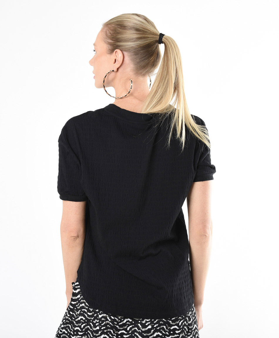 Polera mujer textura botones negra