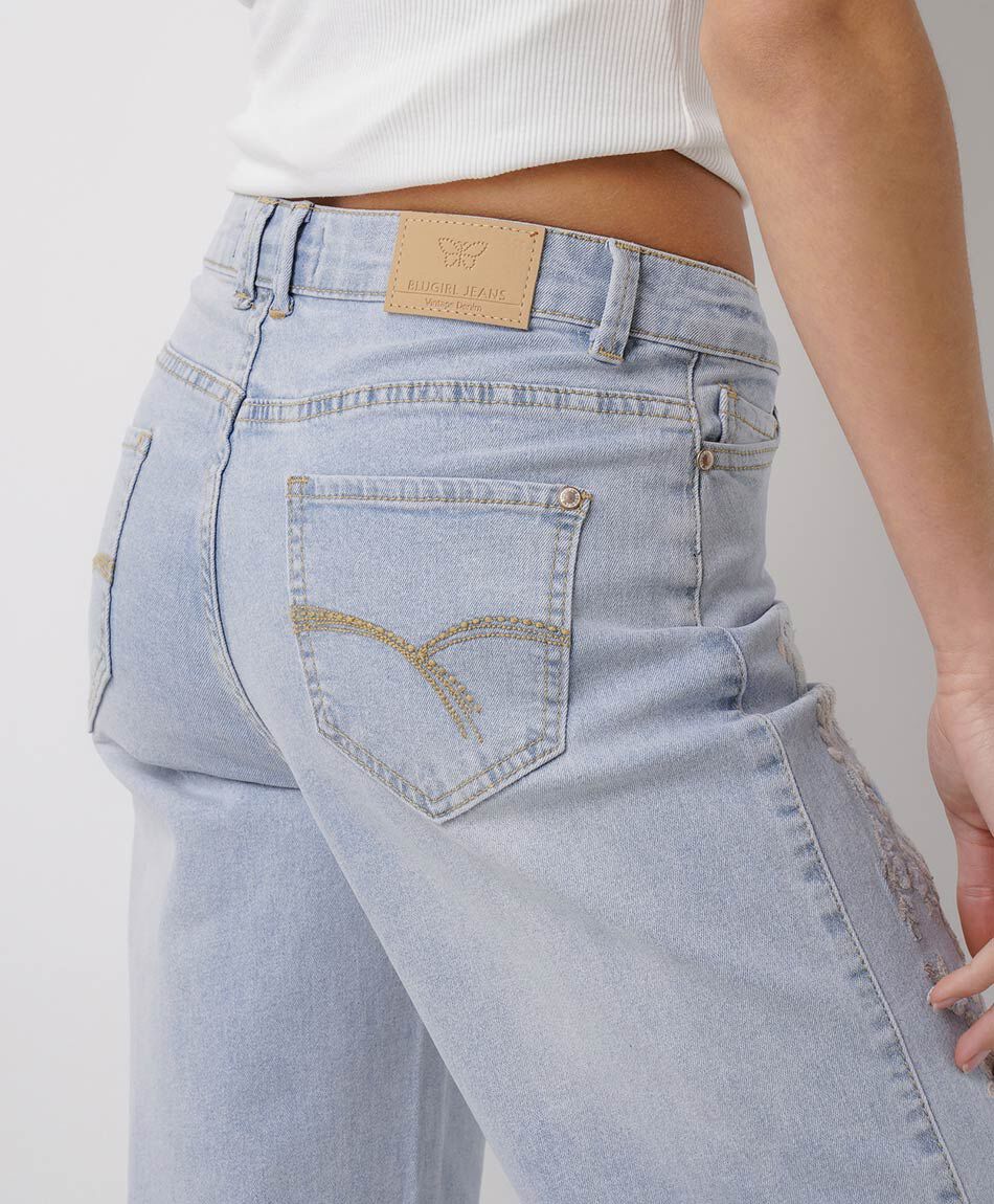 Jeans mujer wide leg flores bordadas lateral