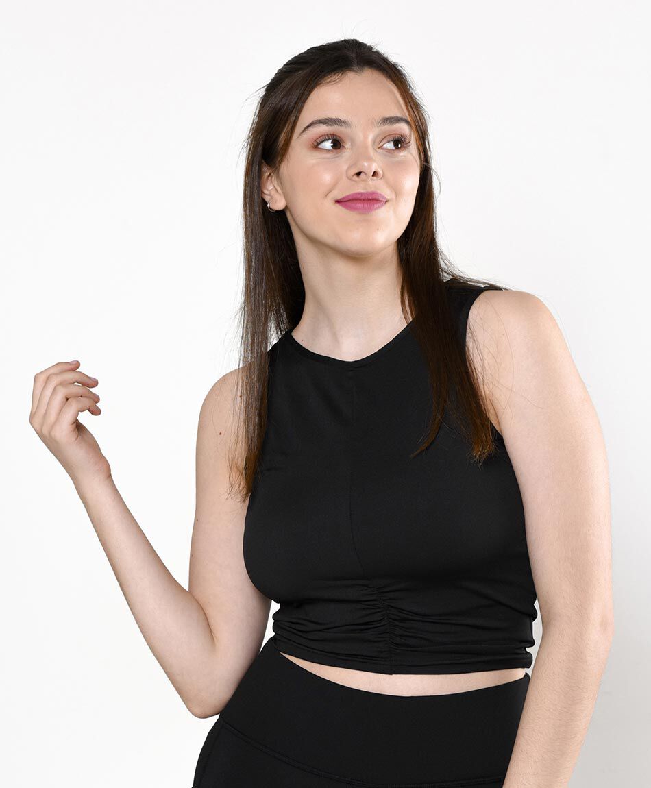 Polera deportiva ajustada sin mangas cuello redondo