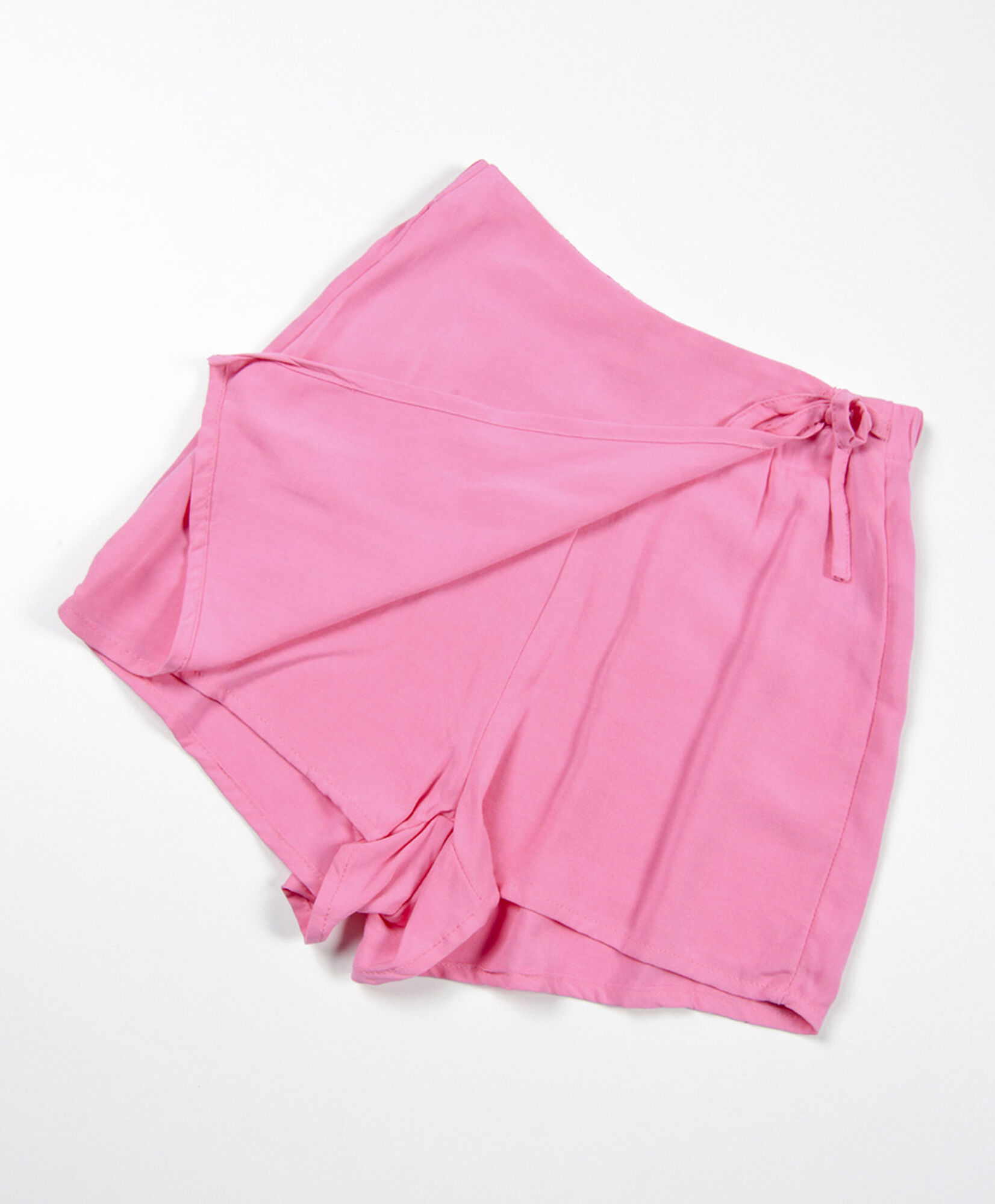 Short niña estilo falda lazo fucsia Short niña estilo falda lazo fucsia