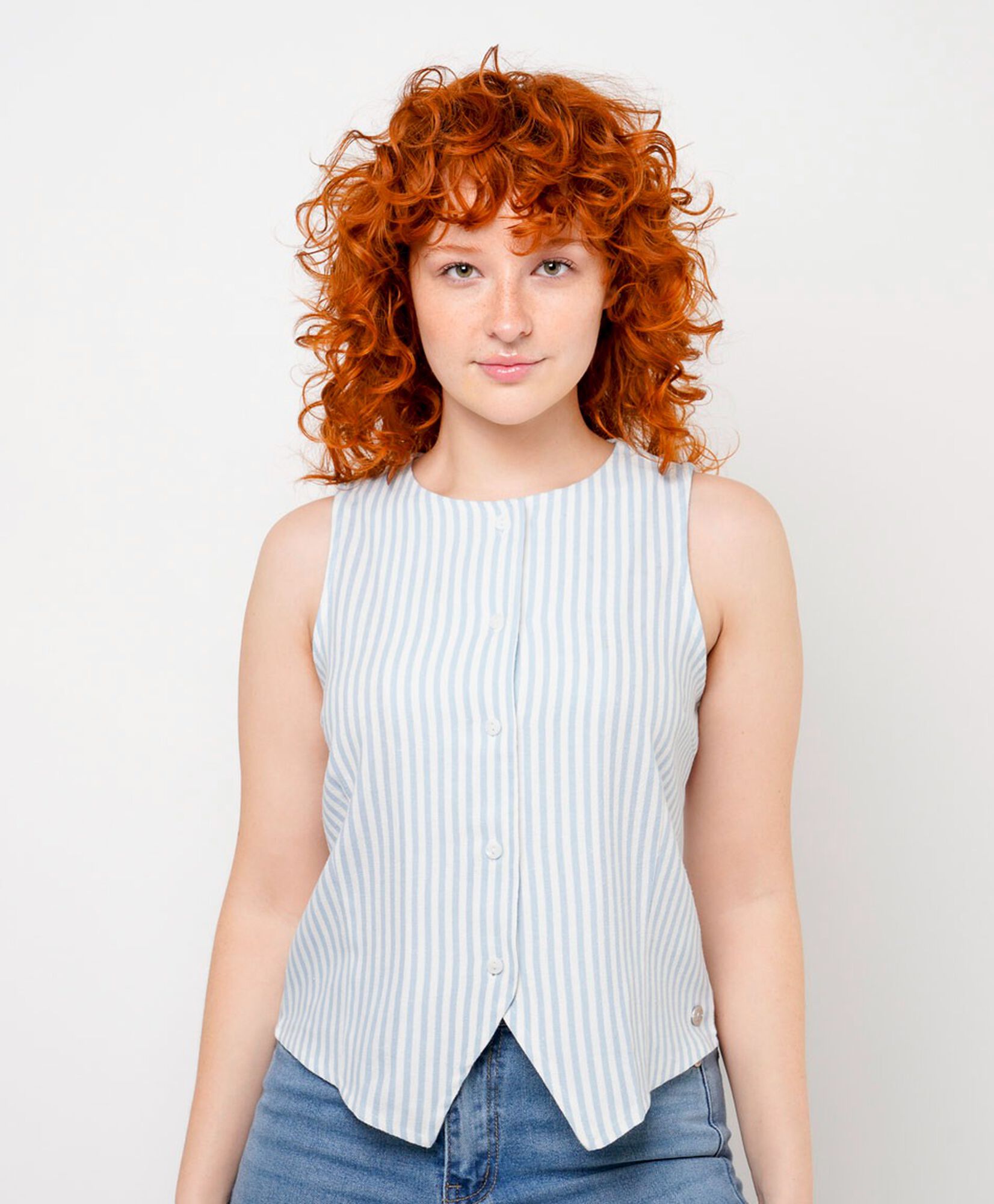 Blusa mujer líneas celeste sin mangas Blusa mujer líneas celeste sin mangas