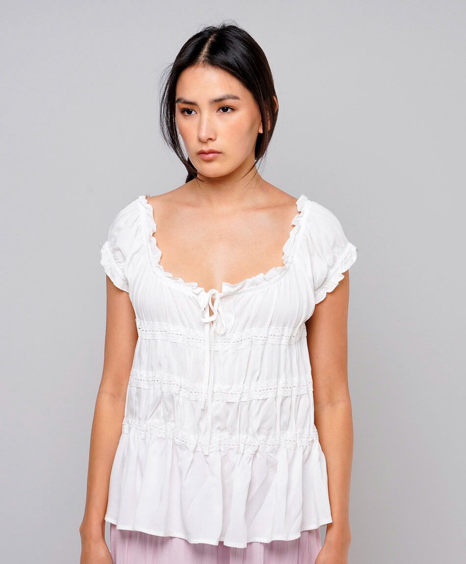 Blusa mujer rom&aacute;ntica pisos