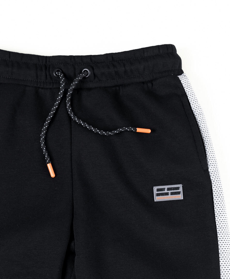 Pantal&oacute;n de buzo ni&ntilde;o l&iacute;nea lateral