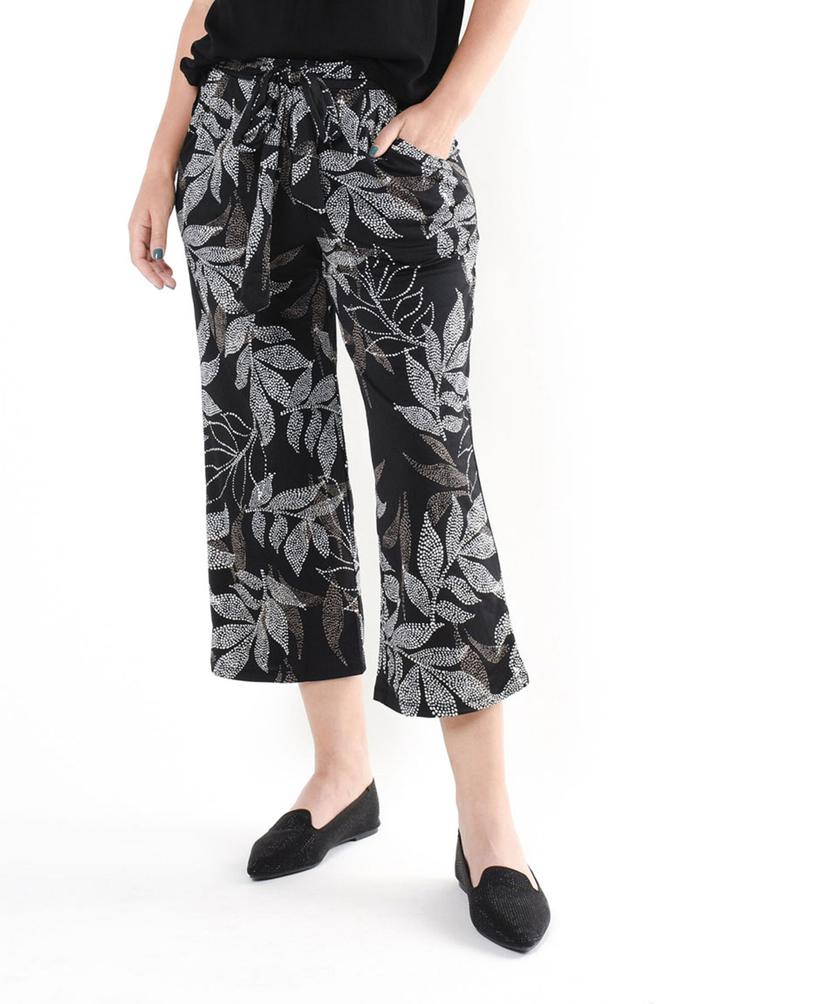 Pantalón mujer estampado hojas negro Pantalón mujer estampado hojas negro