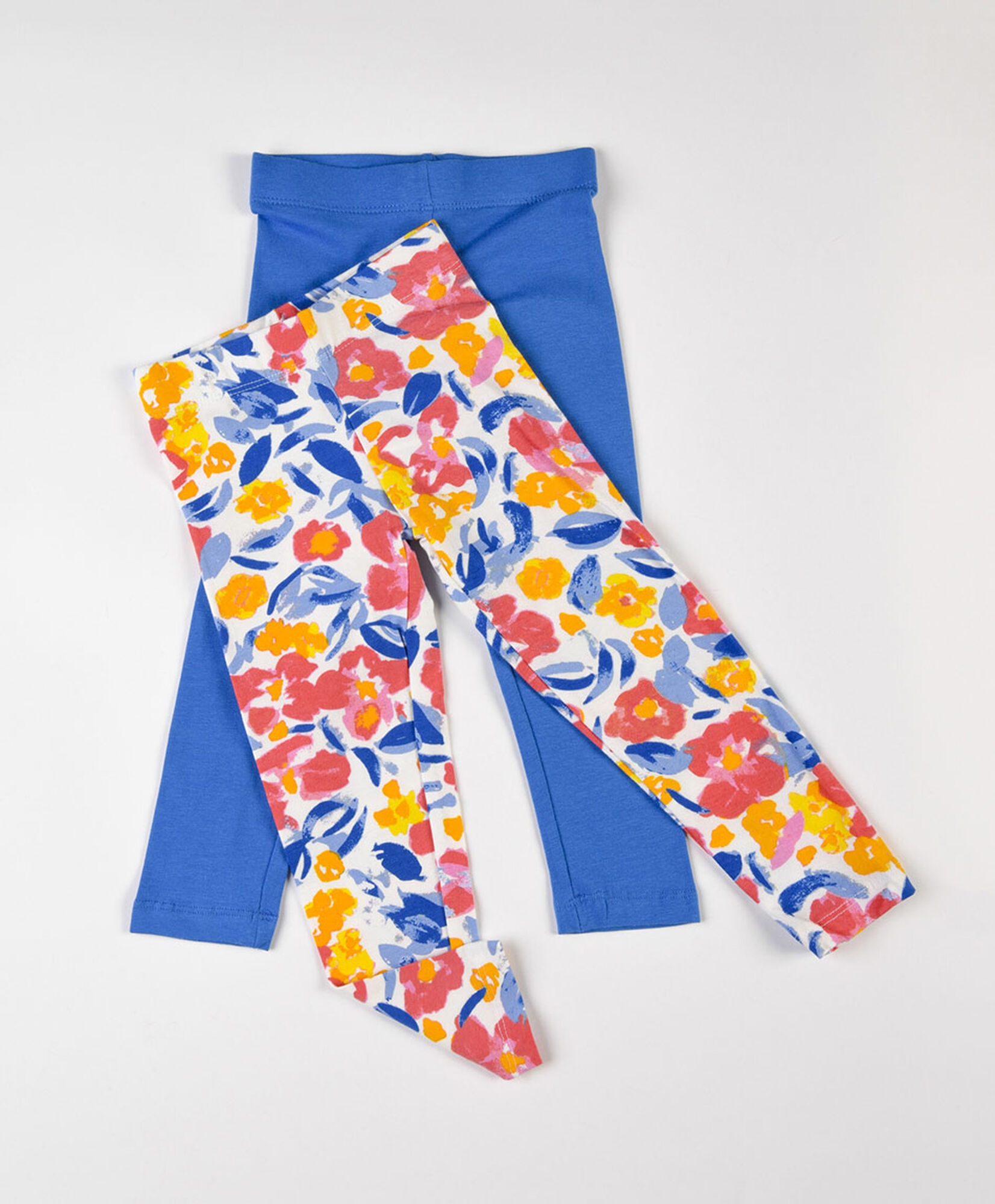 Pack 2 leggins bebé floreada y azul Pack 2 leggins bebé floreada y azul