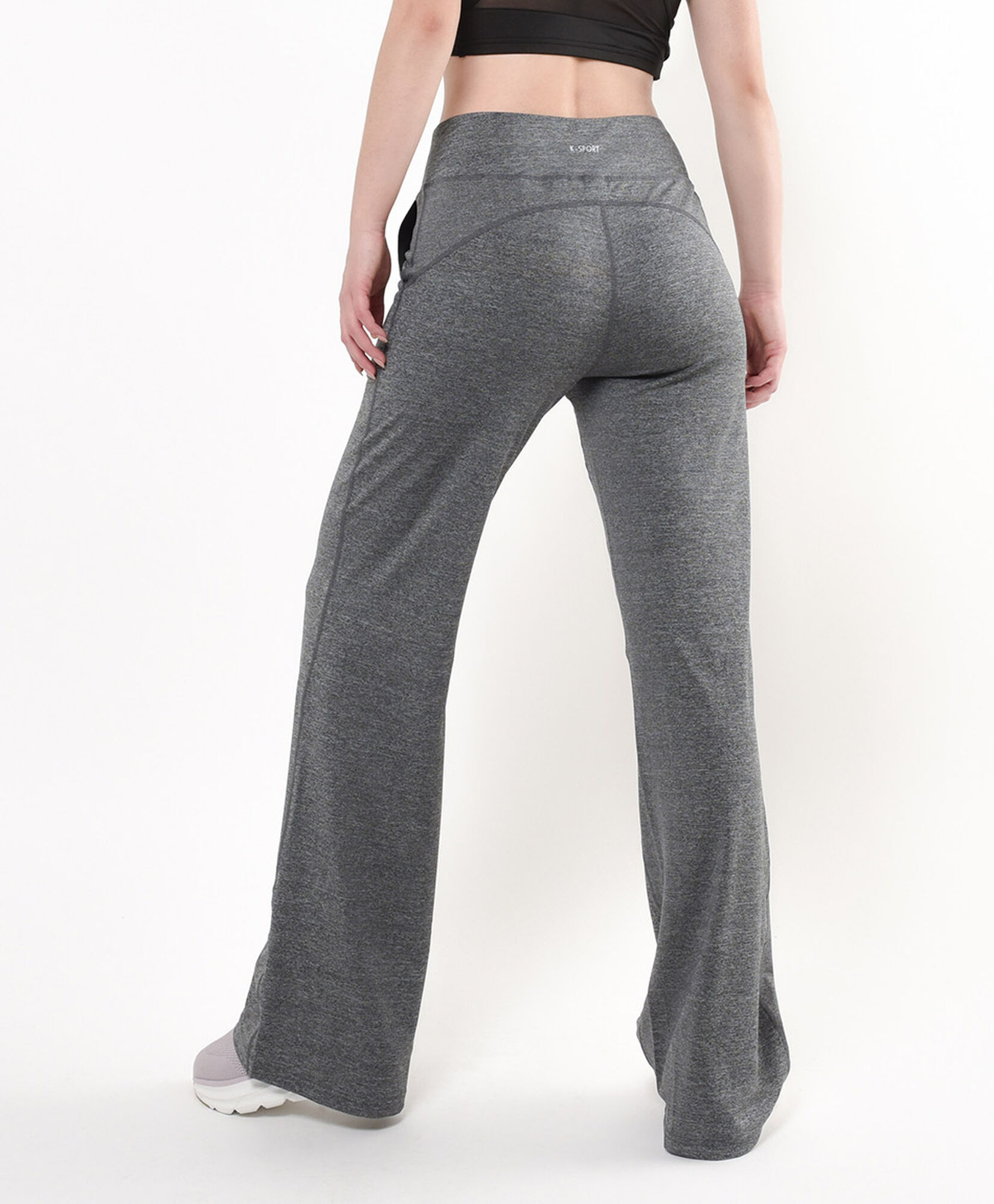 Calza deportiva mujer flare bolsillos Calza deportiva mujer flare bolsillos