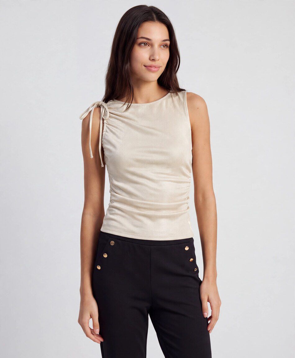 Polera mujer dorada lazo