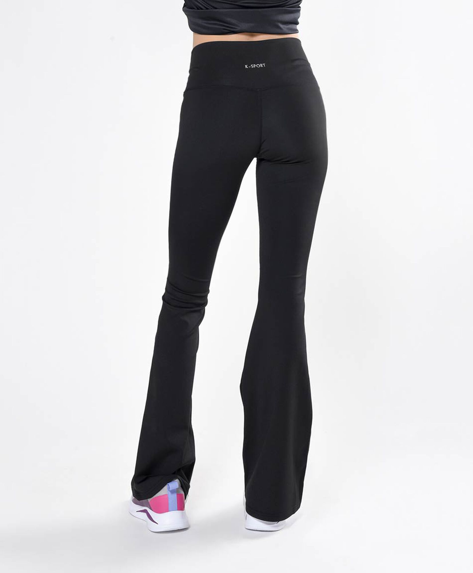 Calza mujer cintura cruzada flare tiro alto Calza mujer cintura cruzada flare tiro alto
