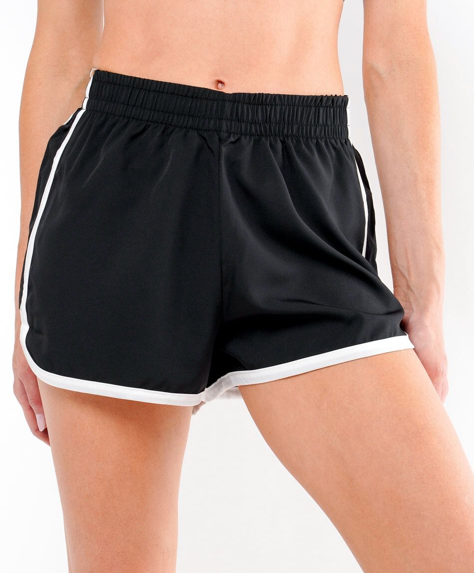 Short deportivo mujer l&iacute;neas blancas