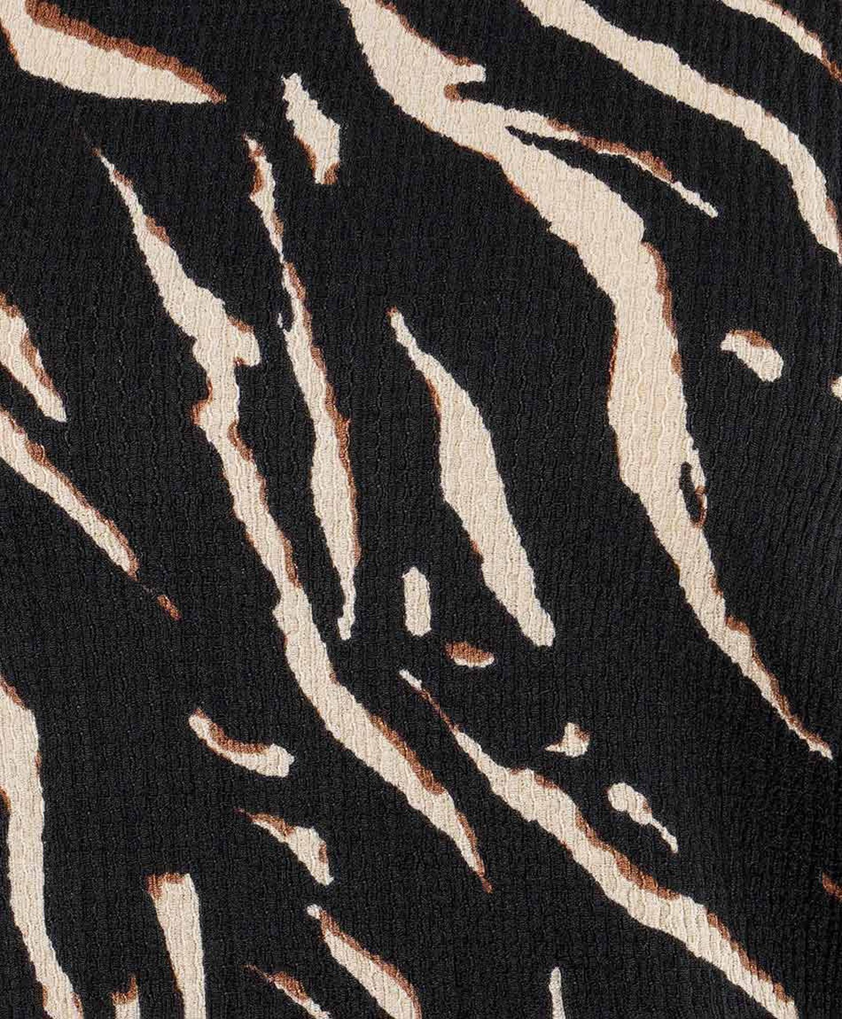 Polera mujer animal print bicolor Polera mujer animal print bicolor