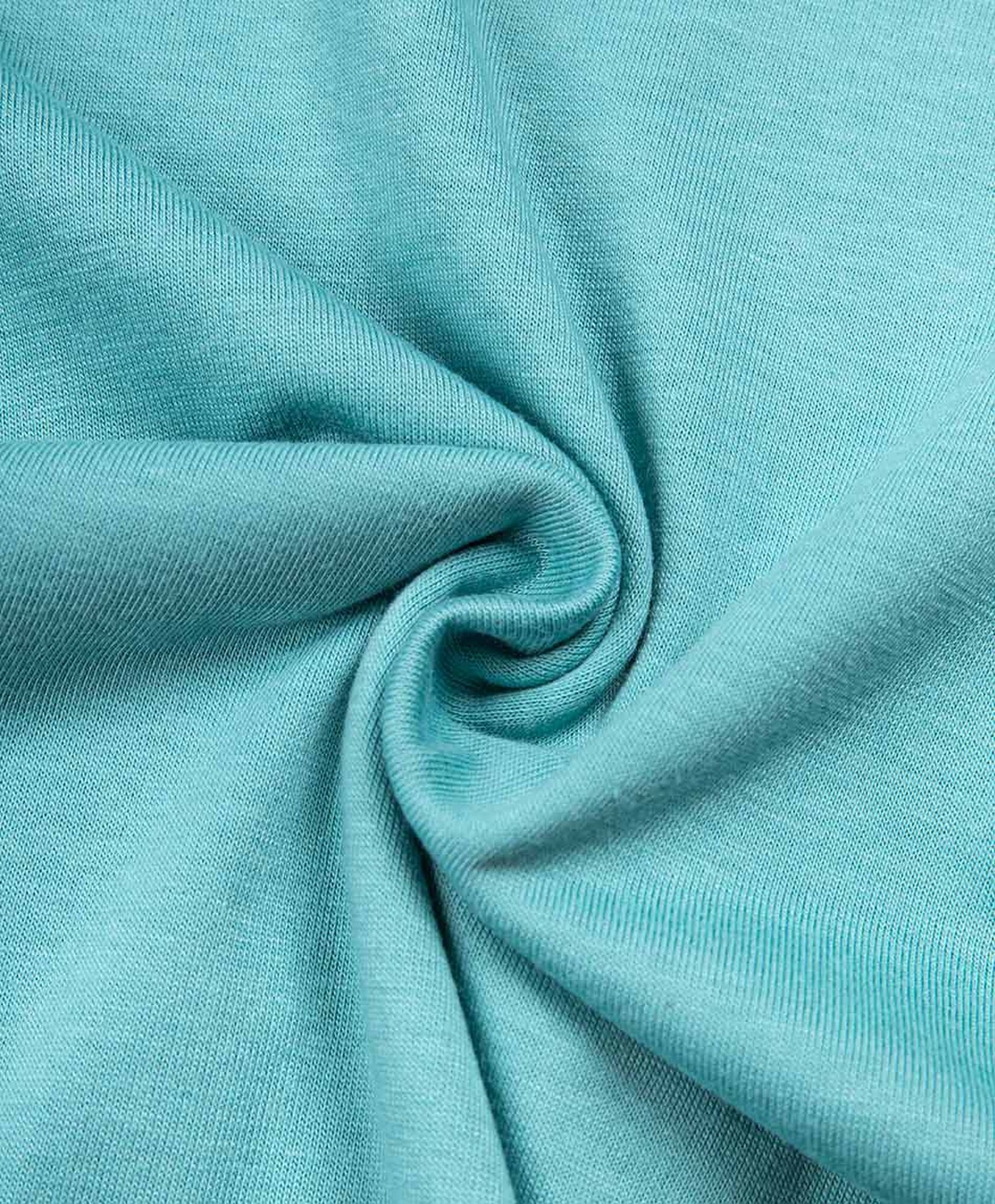 Polera bebé básica turquesa Polera bebé básica turquesa