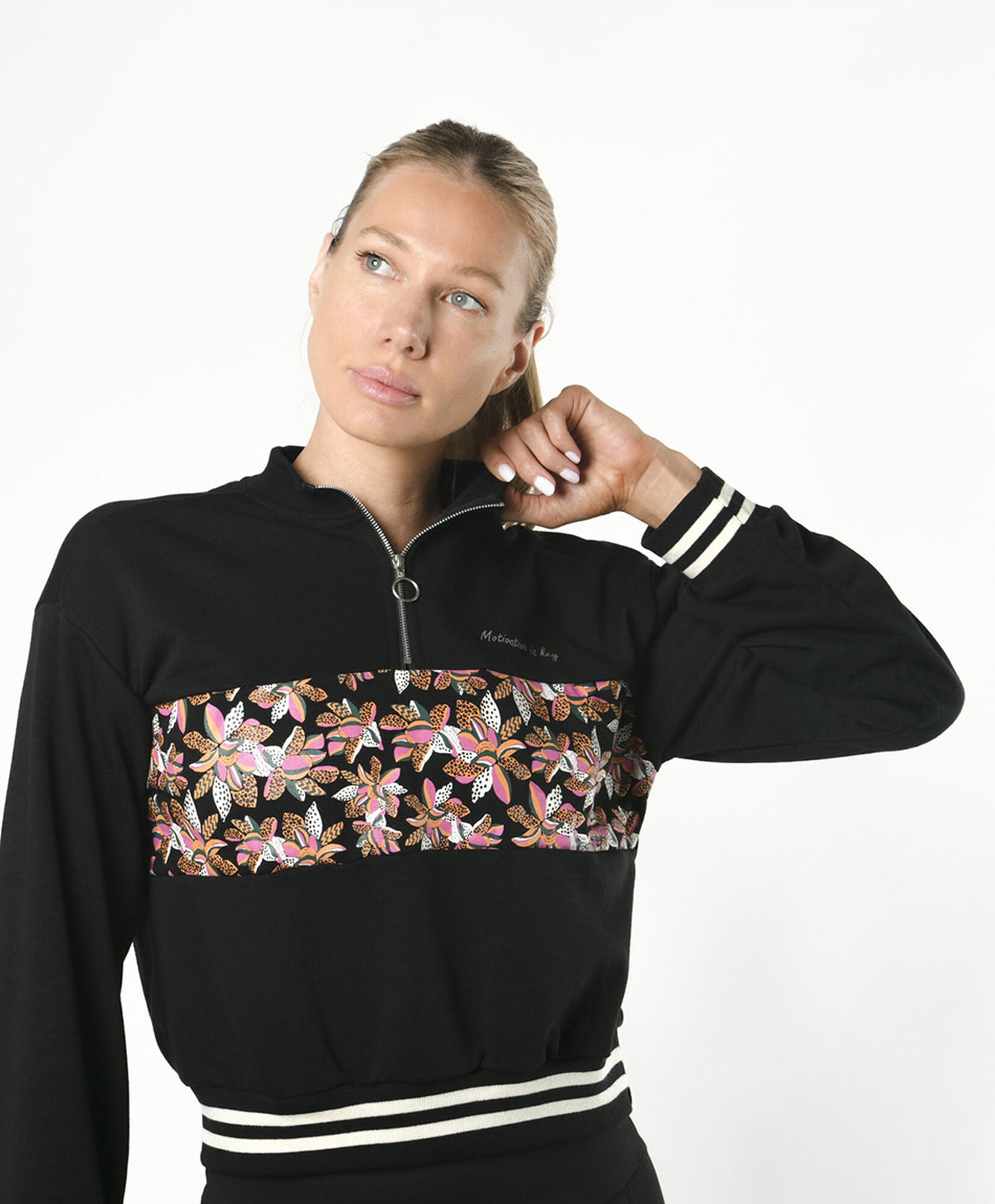 Polerón deportivo mujer floreado líneas Polerón deportivo mujer floreado líneas