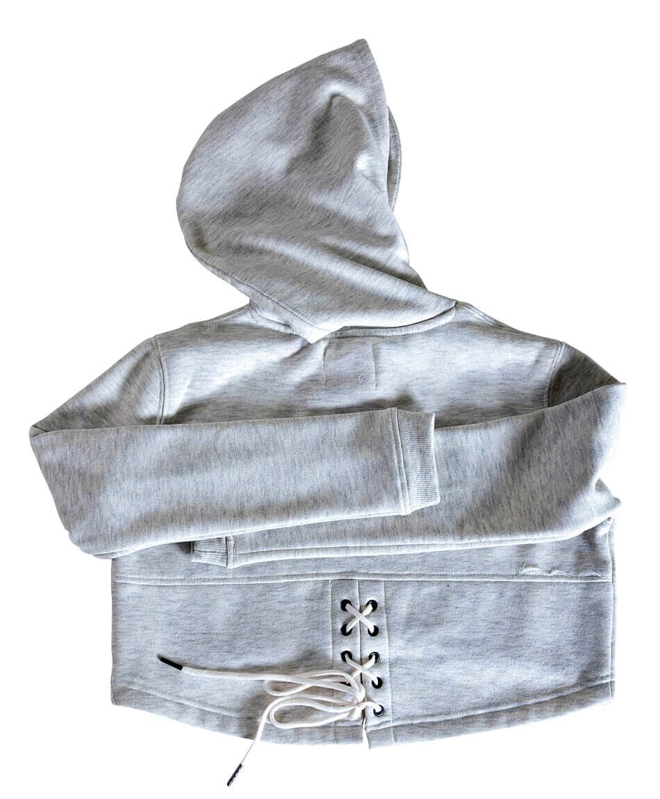 Poleron detalle ojetillos