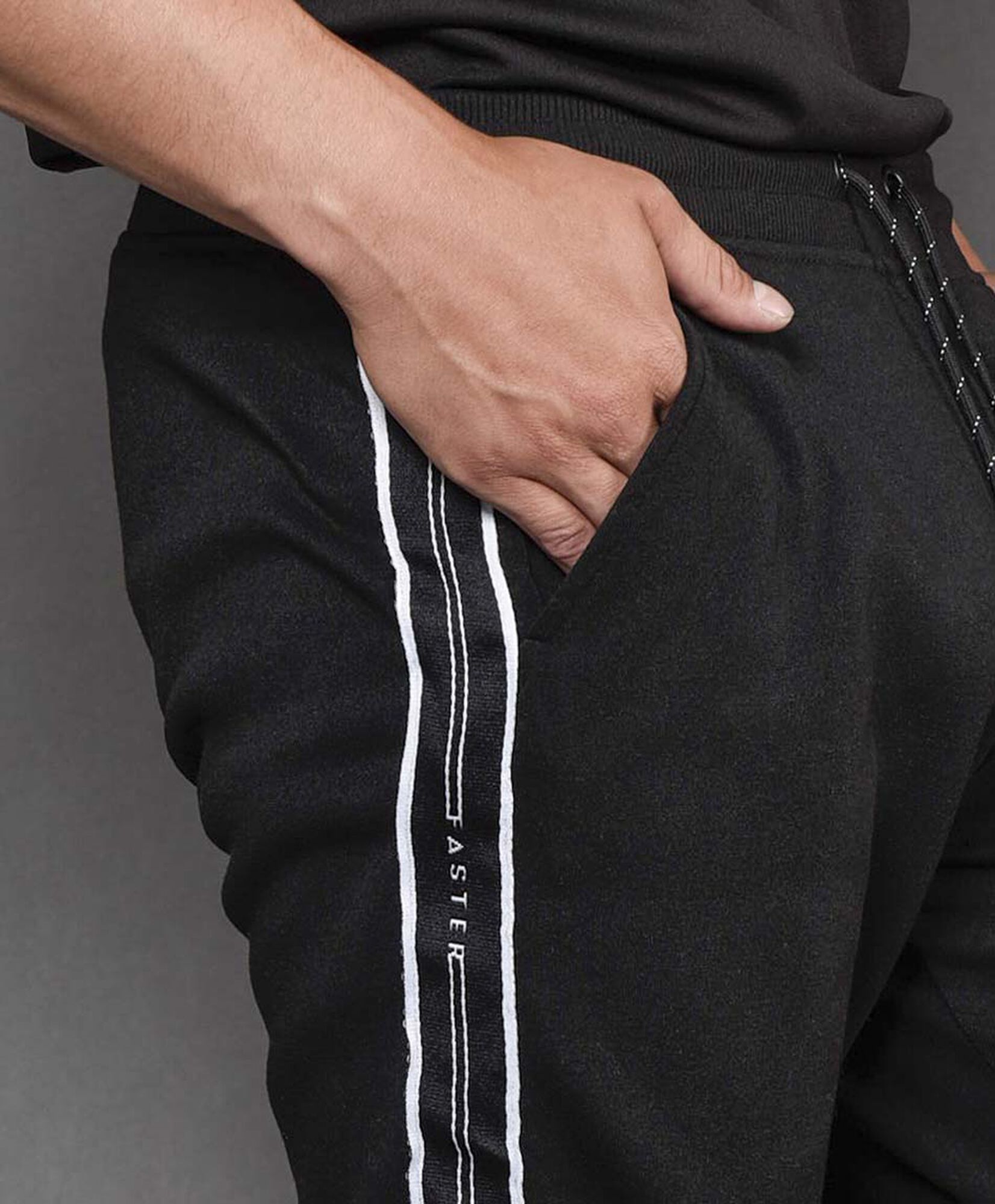 Pantalón de buzo hombre deportivo franja lateral Pantalón de buzo hombre deportivo franja lateral