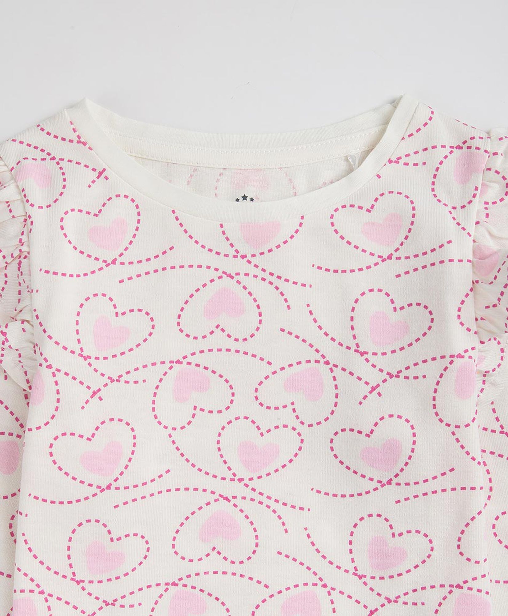 Polera bebé corazones vuelos Polera bebé corazones vuelos