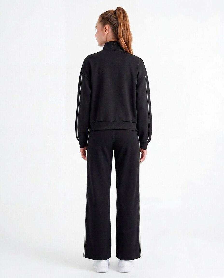 Pantal&oacute;n deportivo mujer l&iacute;neas blancas