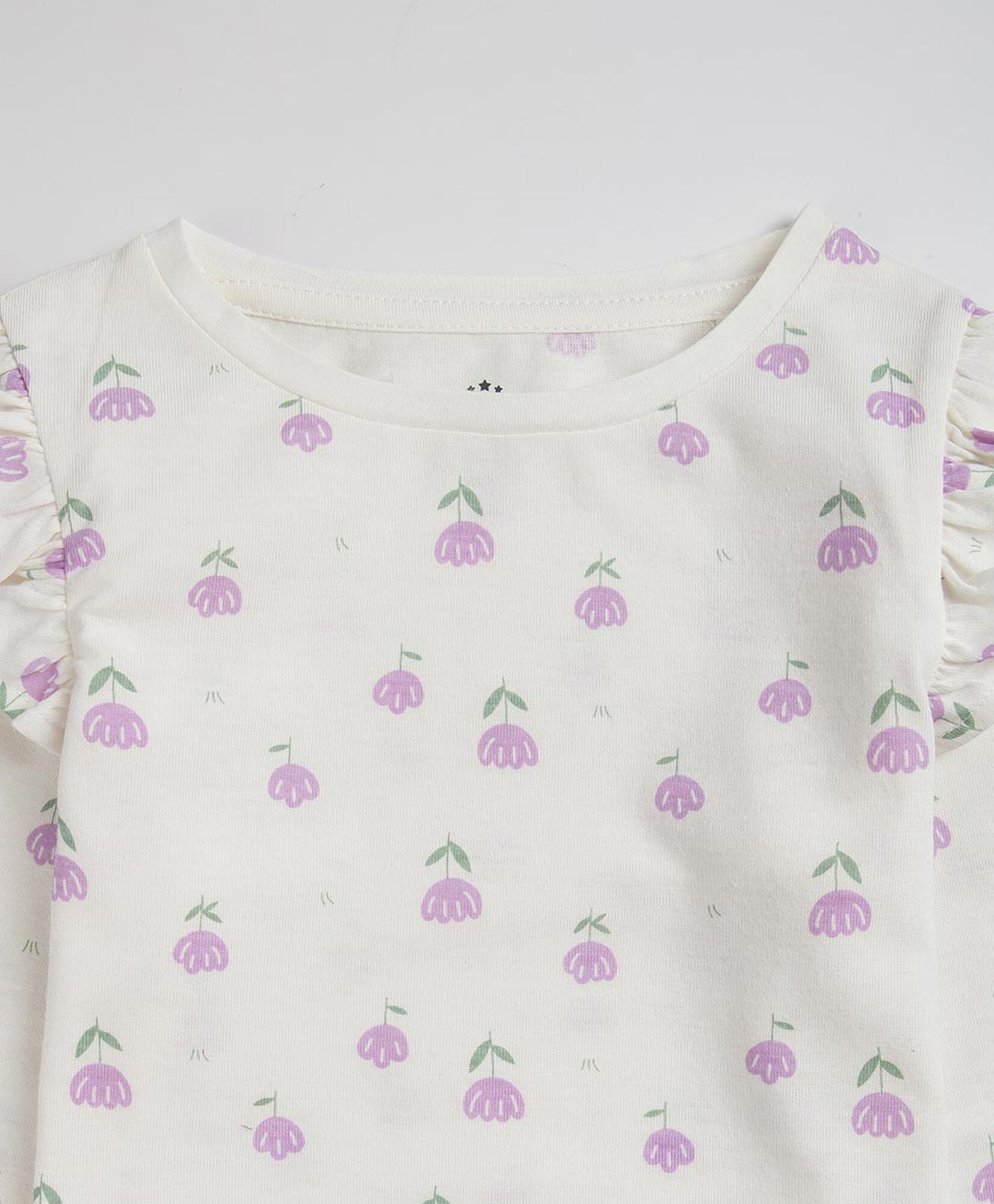 Polera bebé flores vuelos Polera bebé flores vuelos