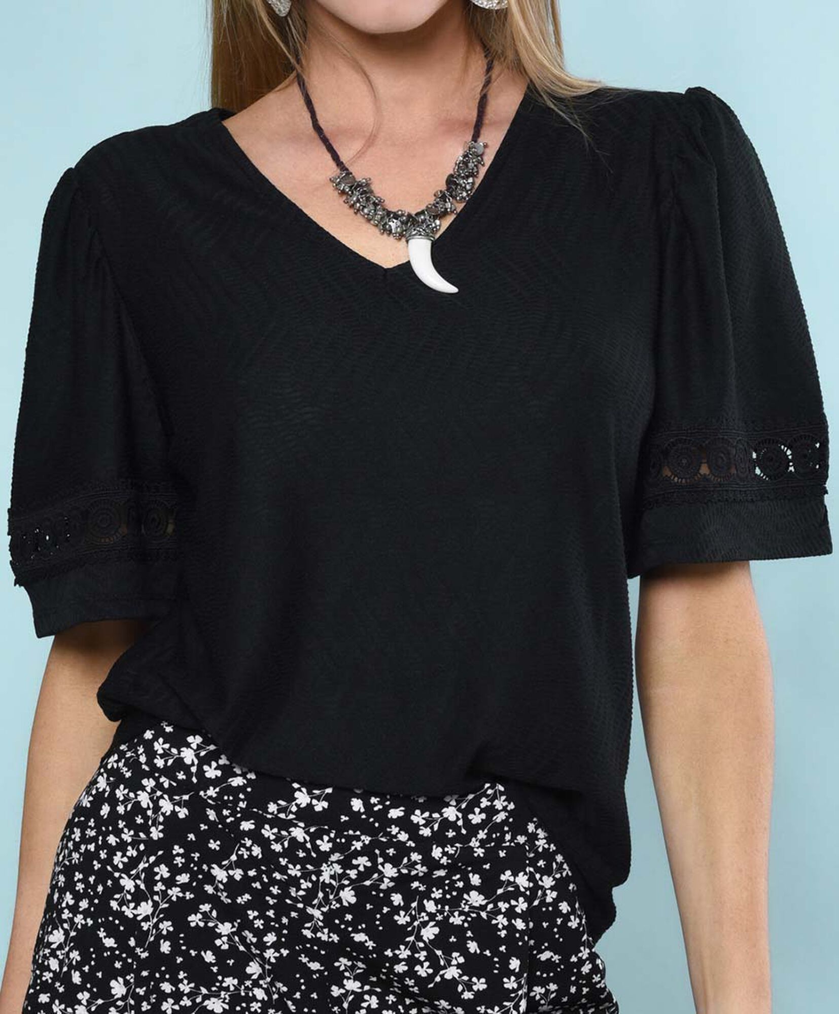 Polera oversize manga corta cuello en v Polera oversize manga corta cuello en v