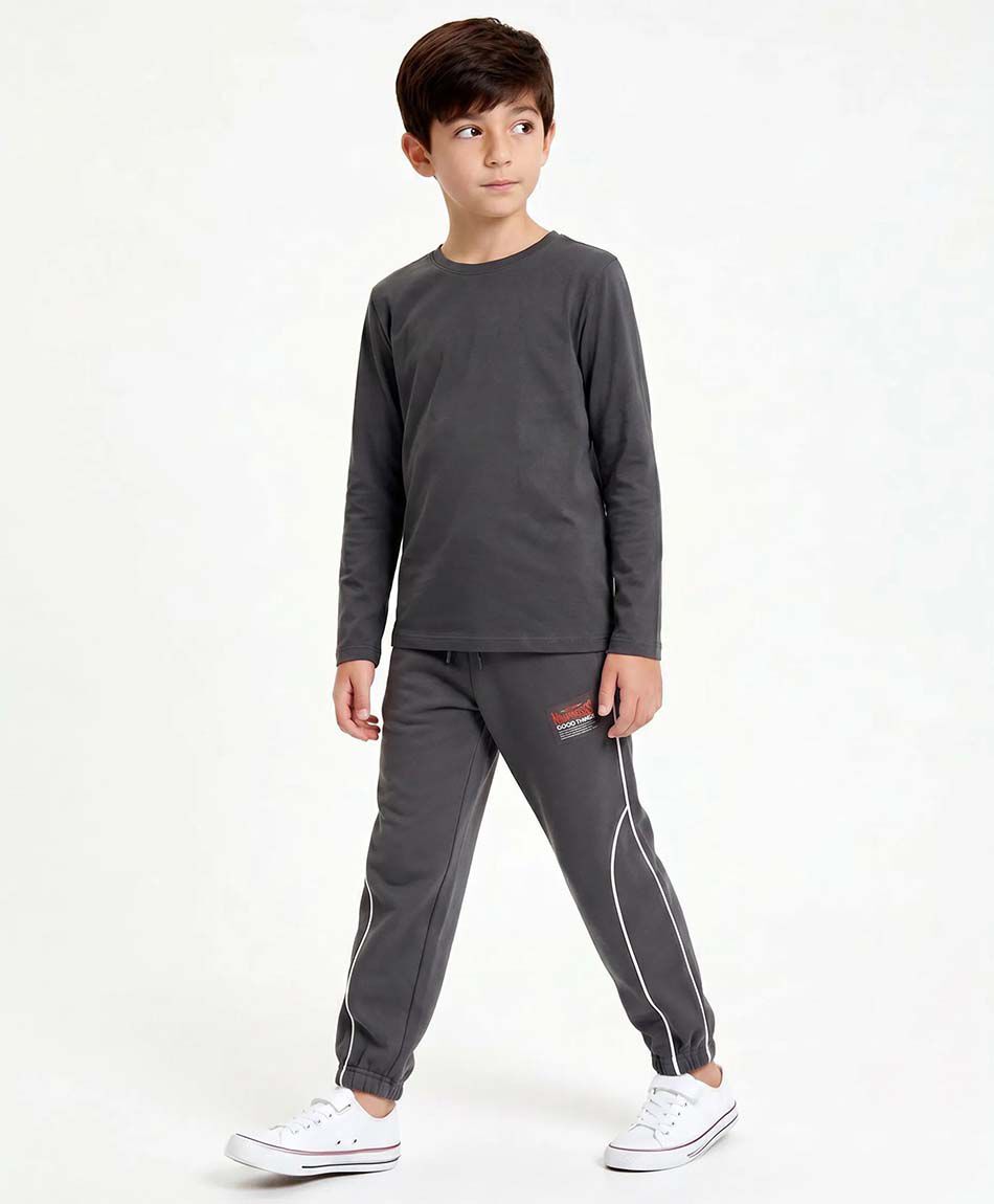 Pantal&oacute;n buzo ni&ntilde;o l&iacute;neas blancas