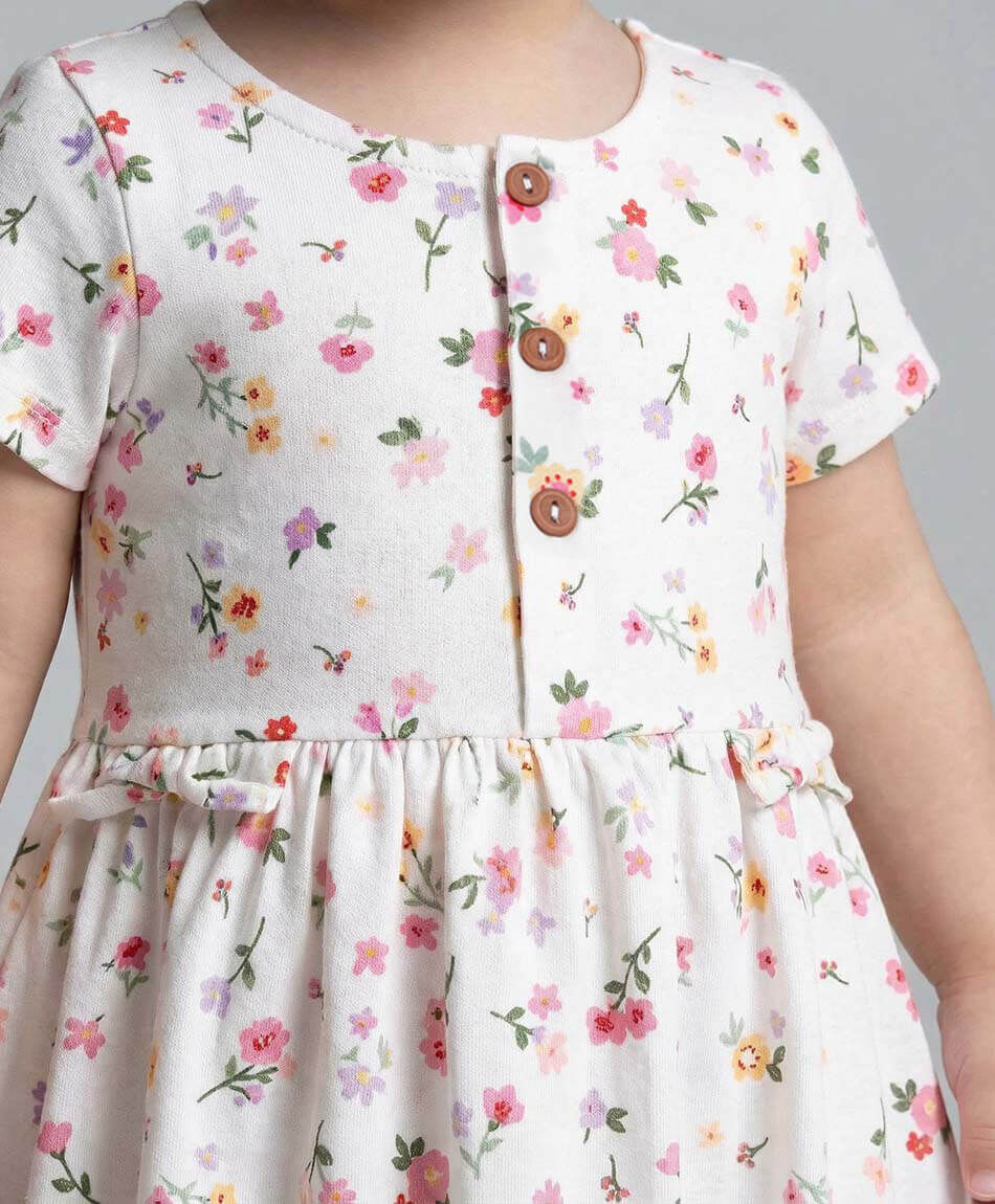 Vestido beb&eacute; florcitas botones