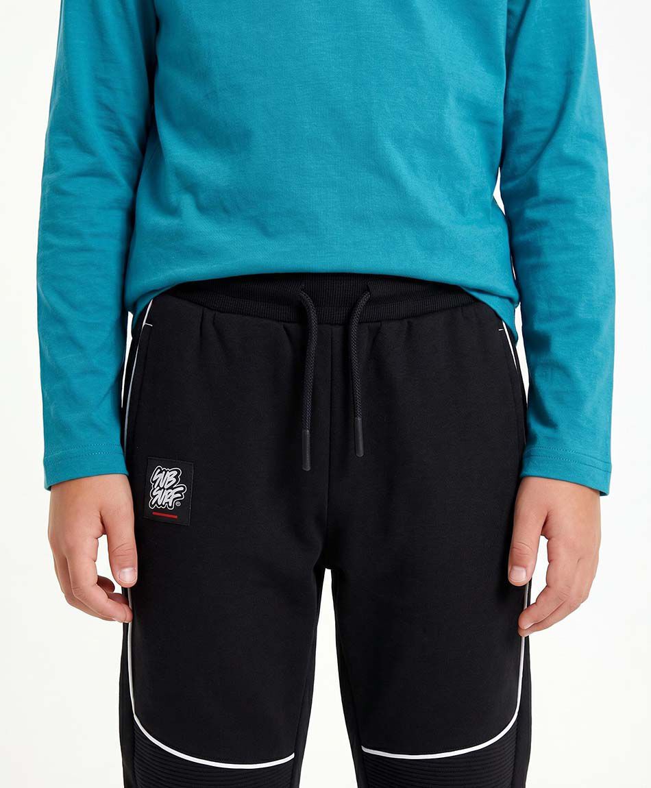 Pantal&oacute;n buzo ni&ntilde;o l&iacute;neas contraste