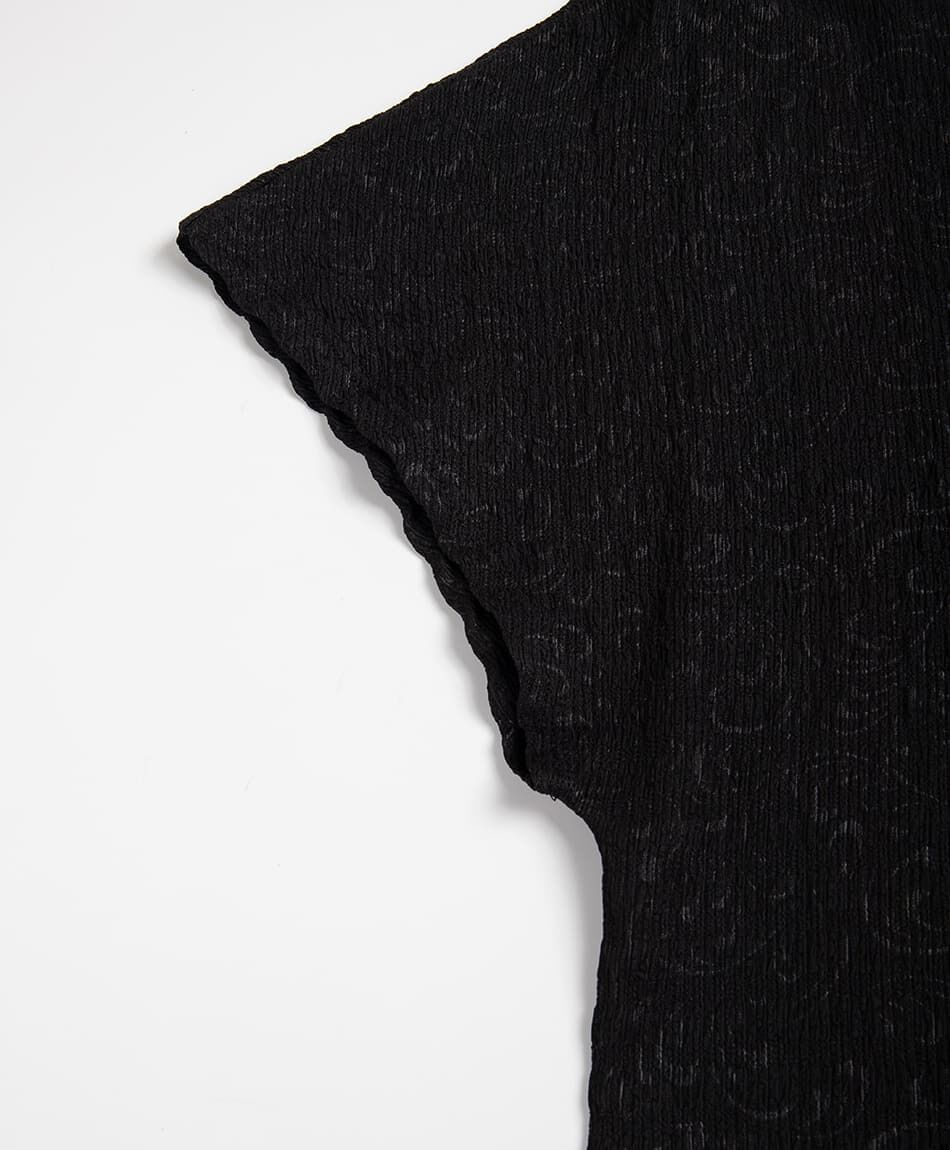 Polera mujer asim&eacute;trica textura
