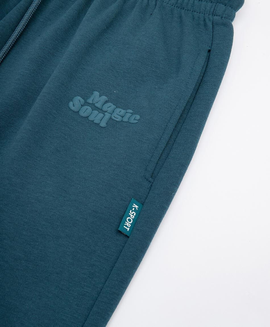 Pantal&oacute;n deportivo mujer jogger turquesa