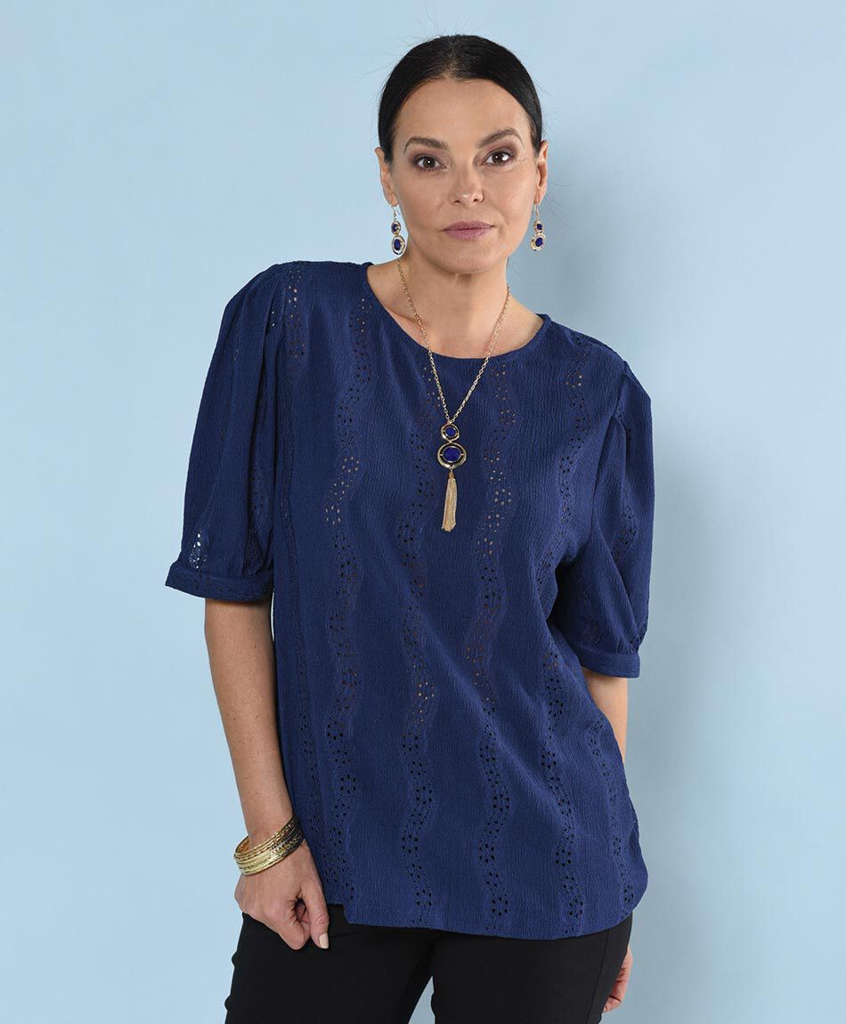 Polera oversize manga corta cuello redondo