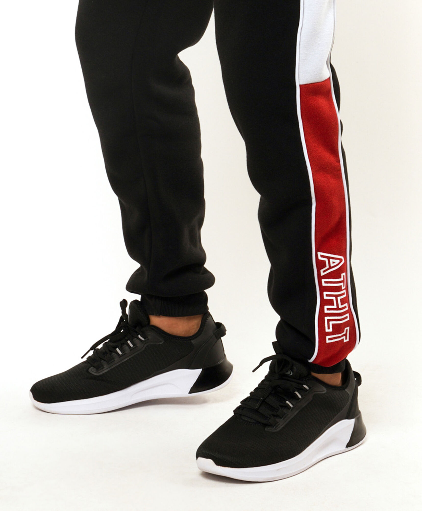 Pantalón deportivo hombre línea bicolor Pantalón deportivo hombre línea bicolor