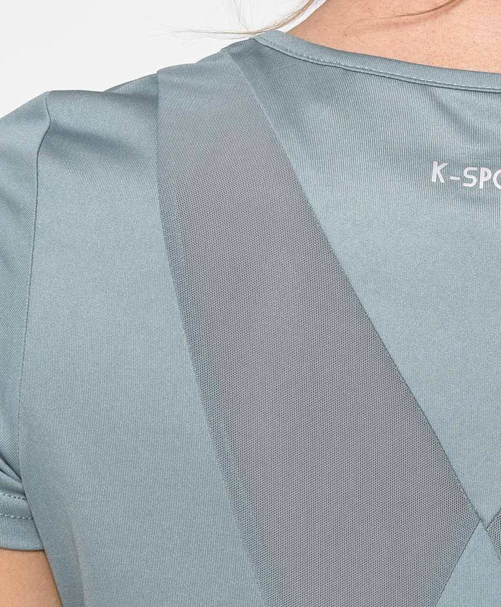 Polera deportiva mujer espalda mesh cruzada Polera deportiva mujer espalda mesh cruzada