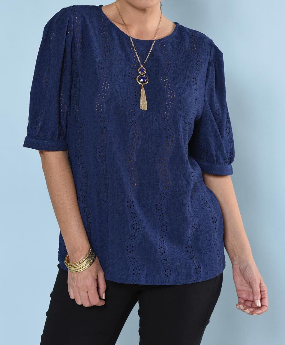 Polera oversize manga corta cuello redondo