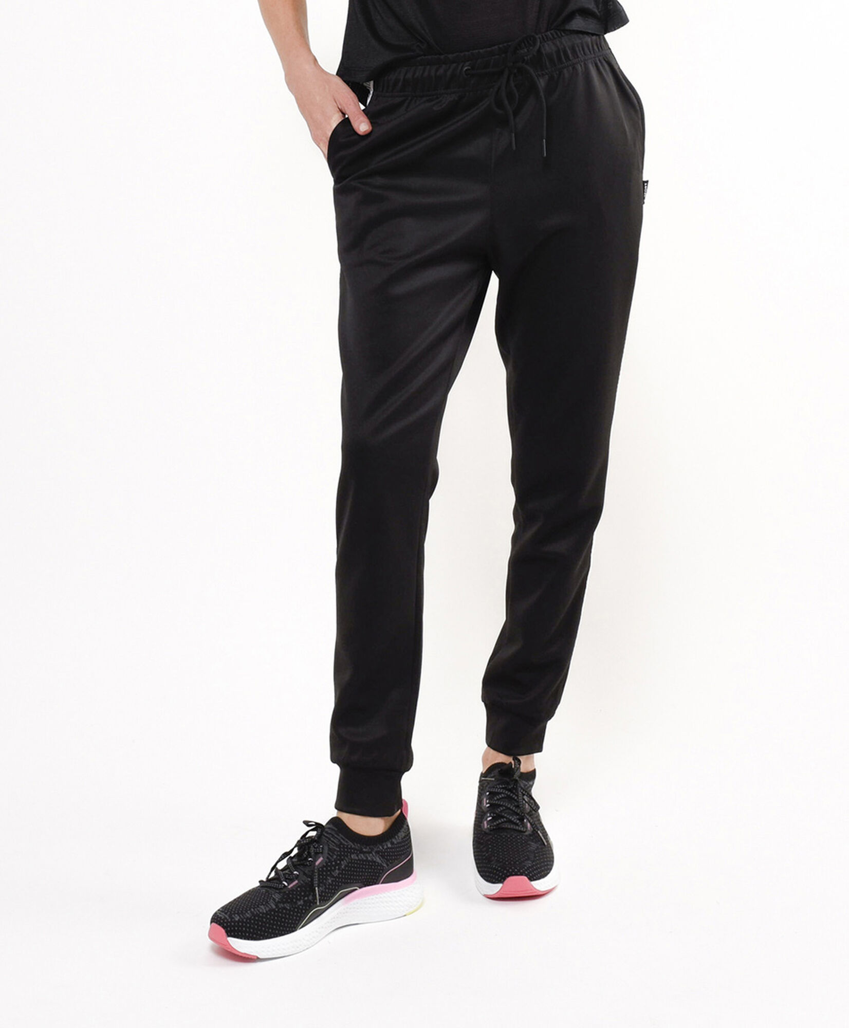 Pantalón deportivo mujer con líneas laterales Pantalón deportivo mujer con líneas laterales