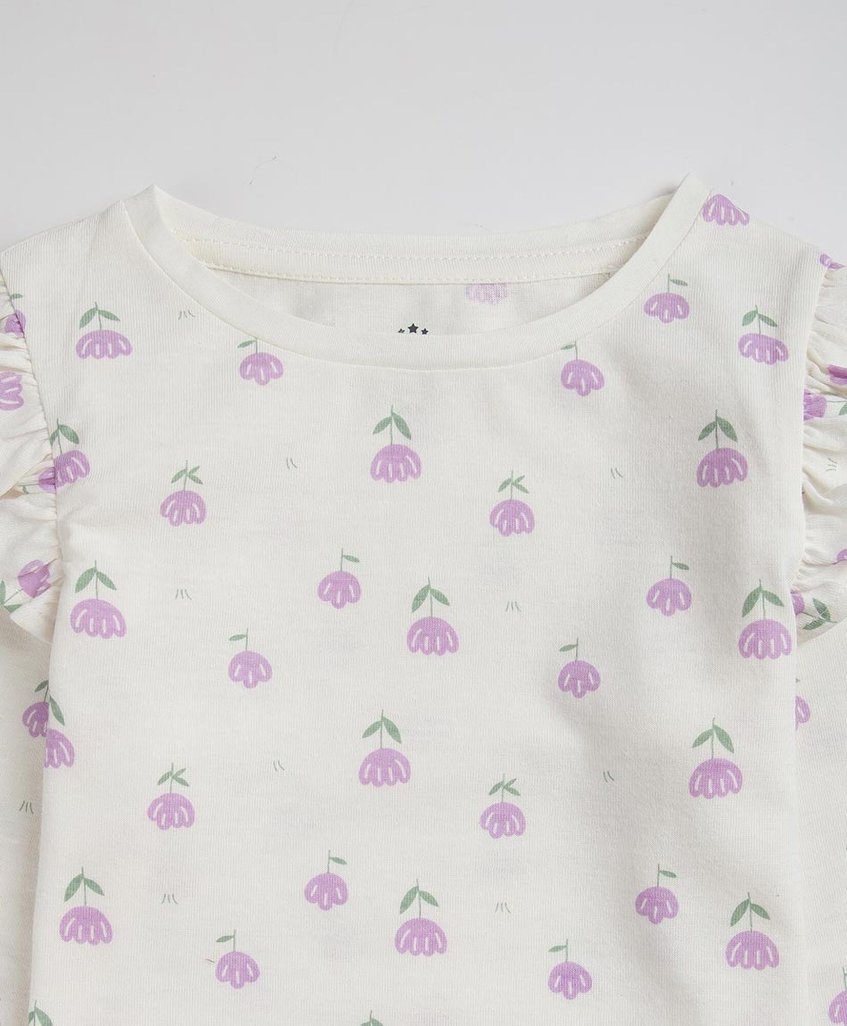 Polera bebé flores vuelos Polera bebé flores vuelos