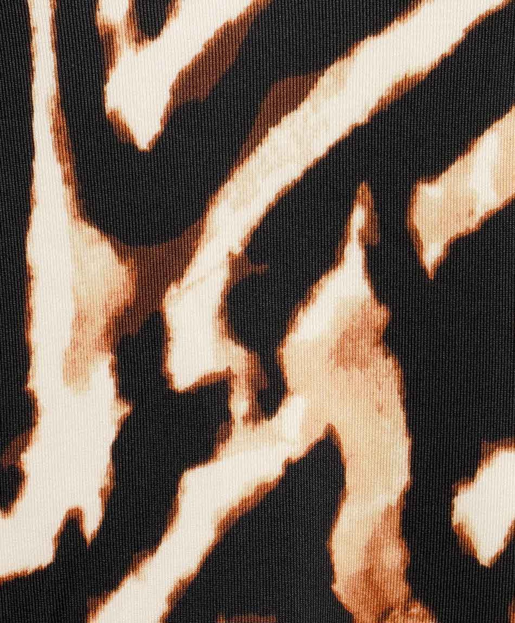 Polera mujer animal print bicolor Polera mujer animal print bicolor