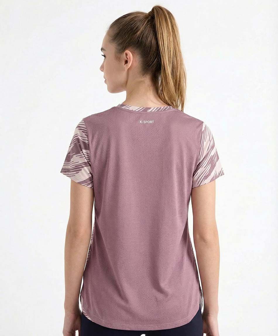 Polera deportiva mujer constrate morado