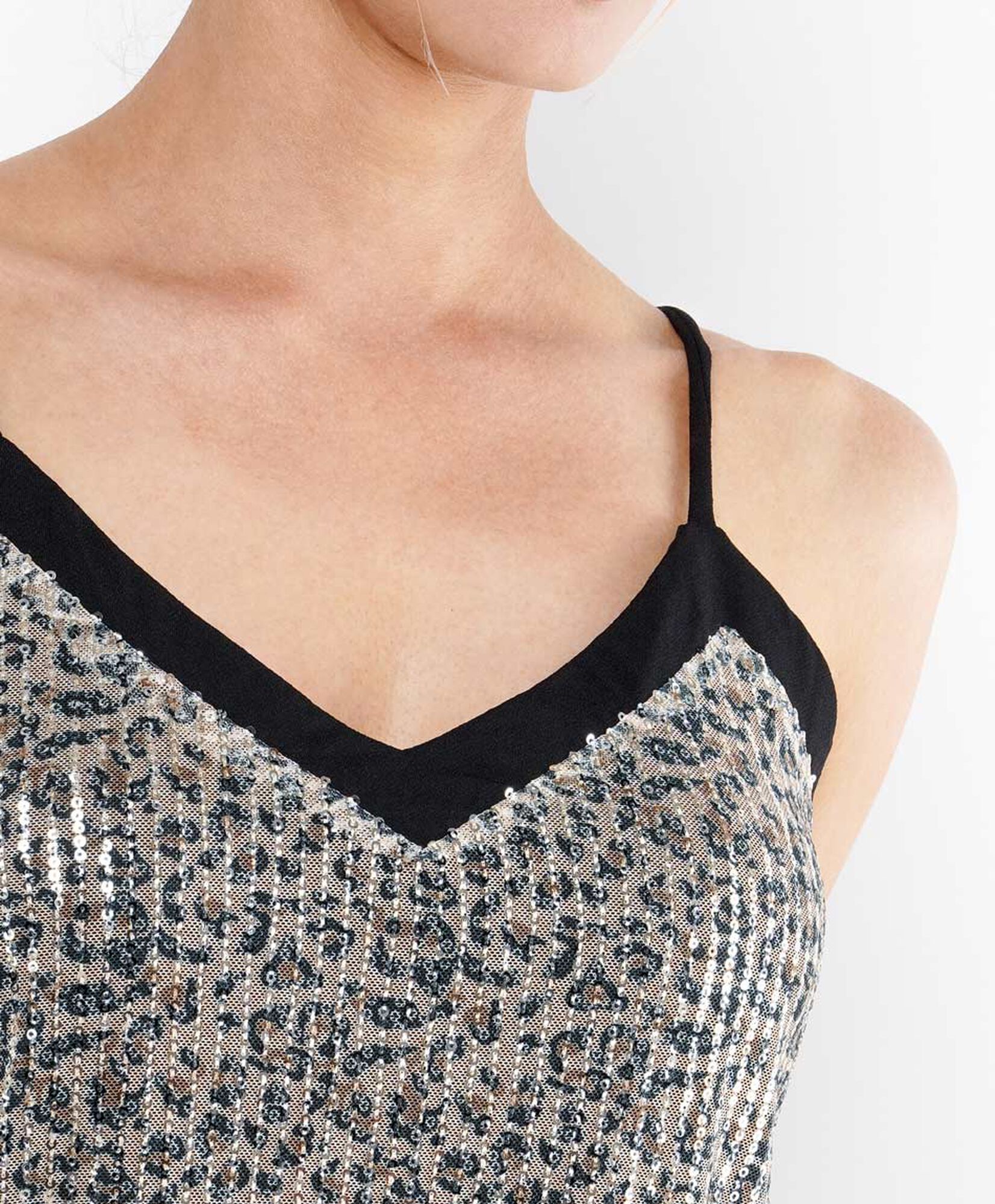 Polera mujer top animal print lentejuelas Polera mujer top animal print lentejuelas