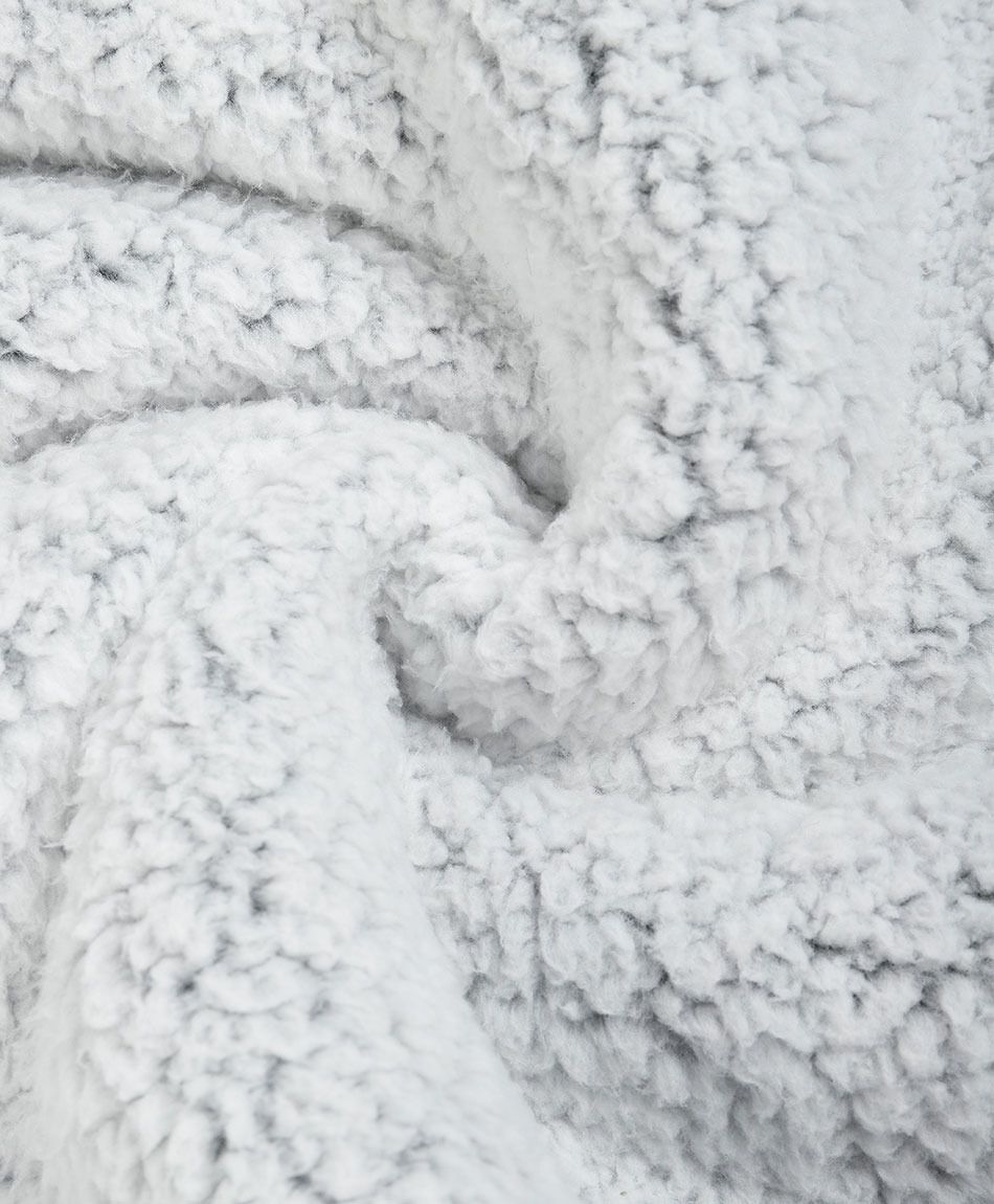 Poler&oacute;n manta mujer pompones oversize