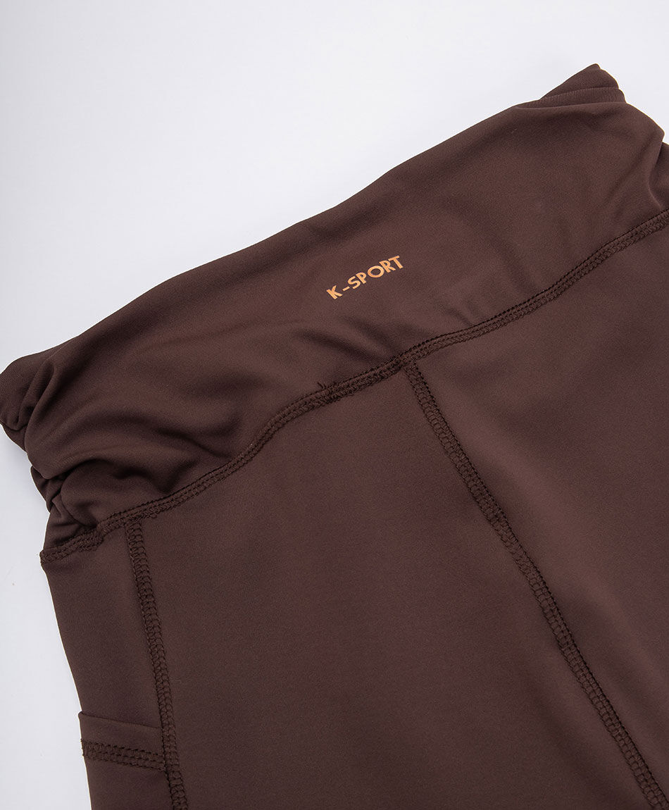 Calza deportiva mujer tiro alto cafe