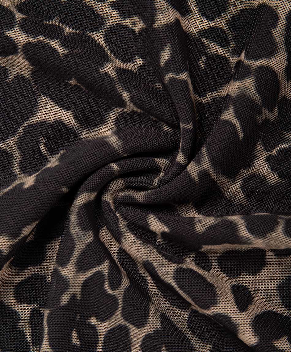 Polera mujer top asim&eacute;trica animal print