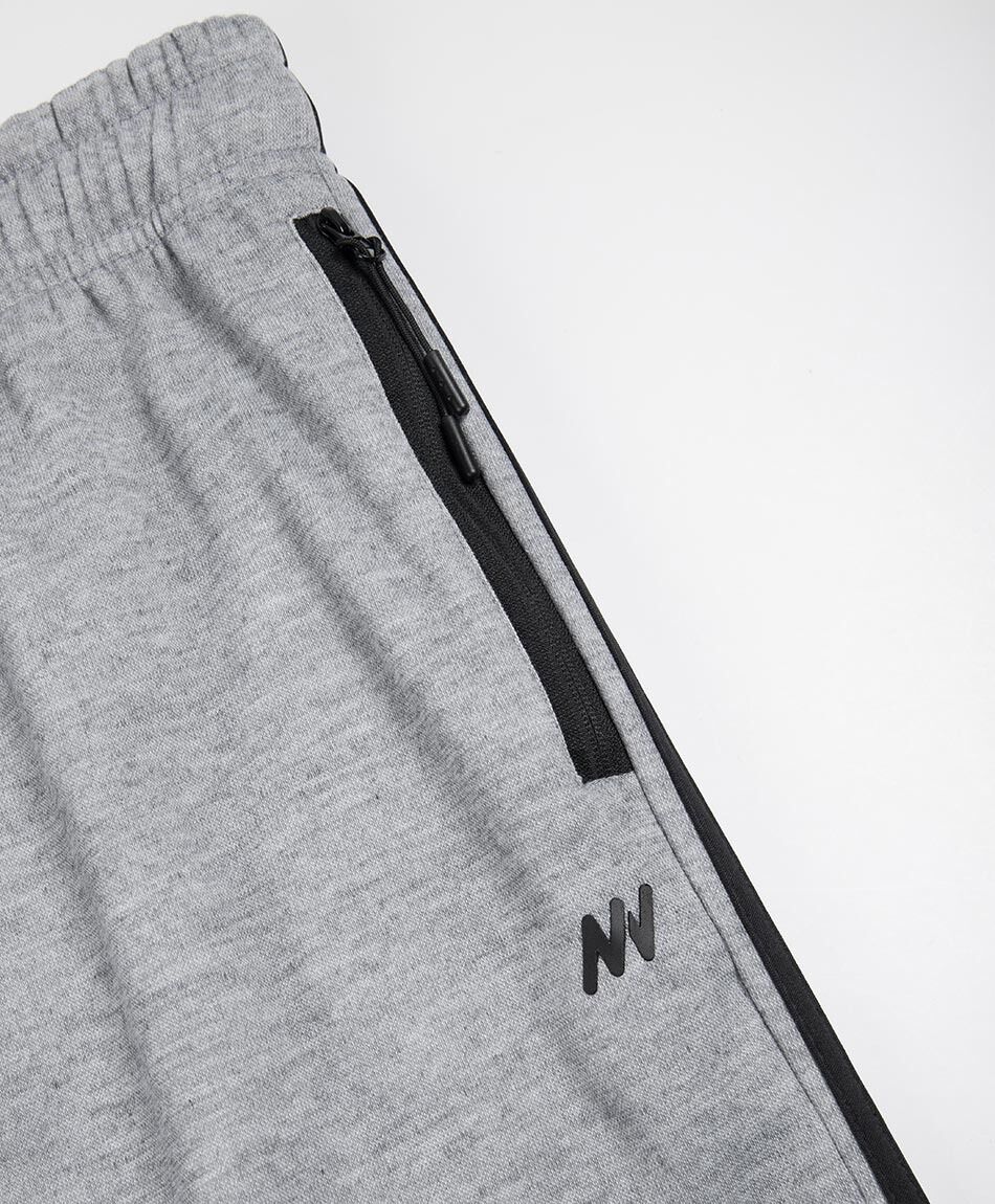 Pantal&oacute;n deportivo hombre gris l&iacute;nea lateral