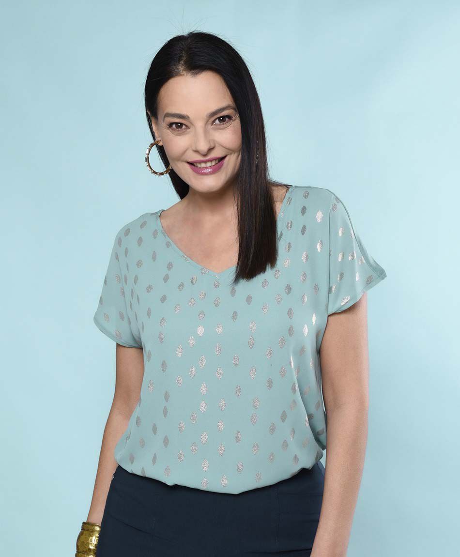 Polera oversize manga corta cuello redondo