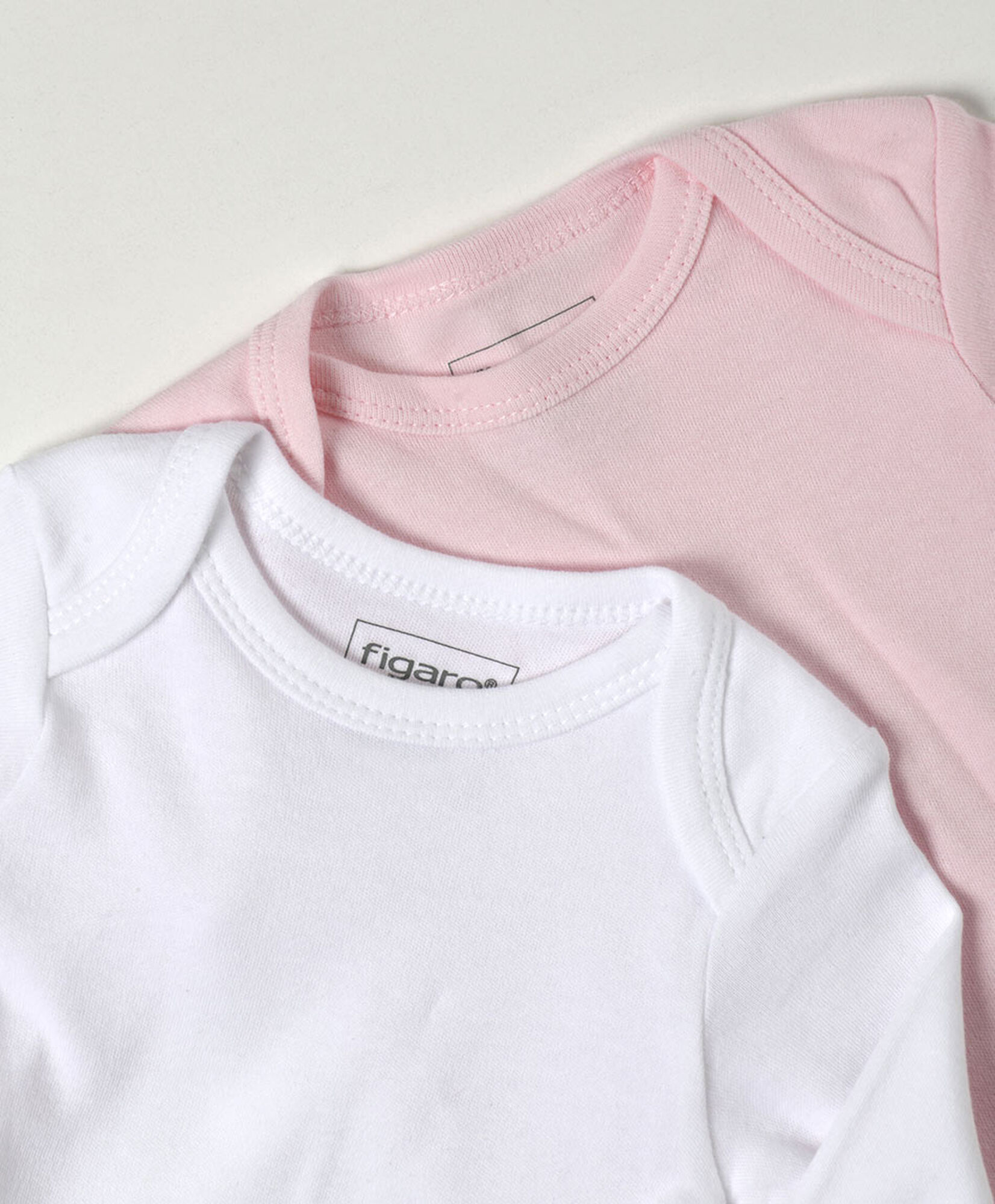 Pack 2 bodies bebé blanco y rosado manga larga Pack 2 bodies bebé blanco y rosado manga larga