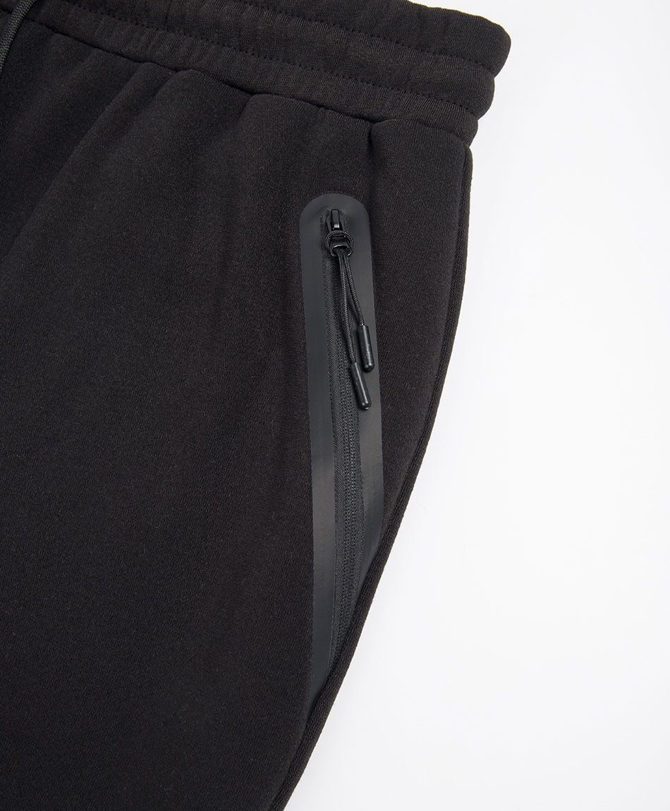 Pantal&oacute;n deportivo hombre negro bolsillos