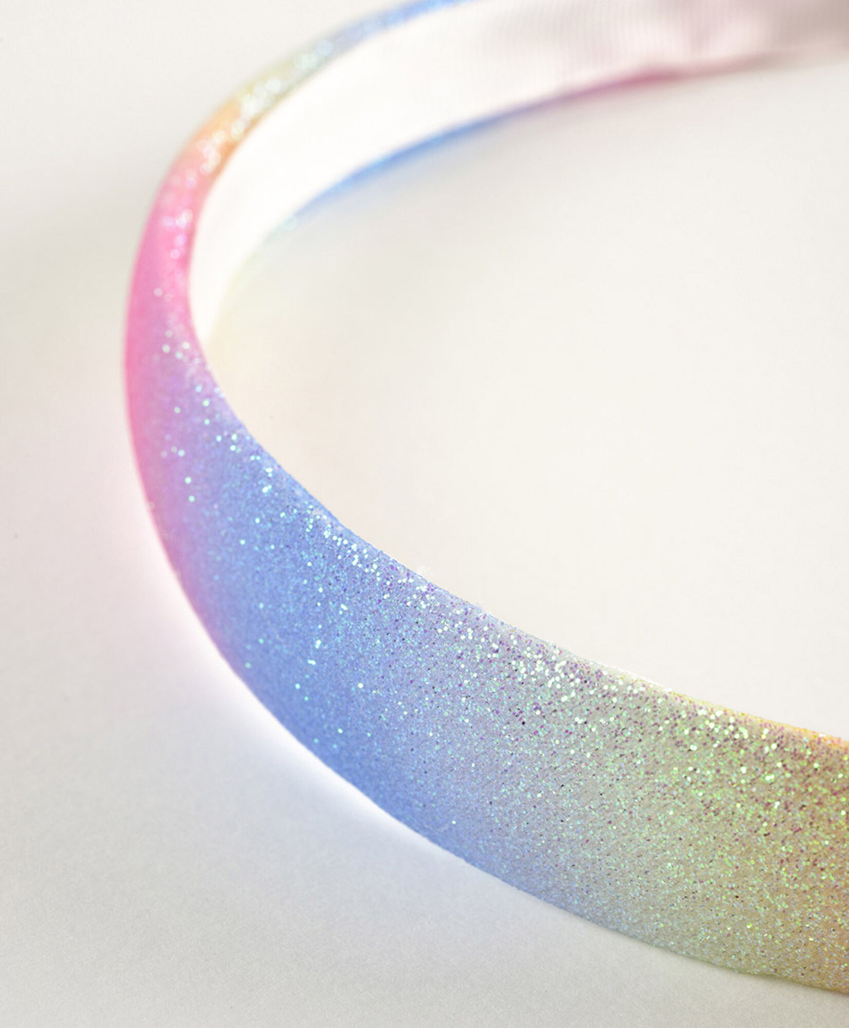 Cintillo niña arcoiris brillante Cintillo niña arcoiris brillante